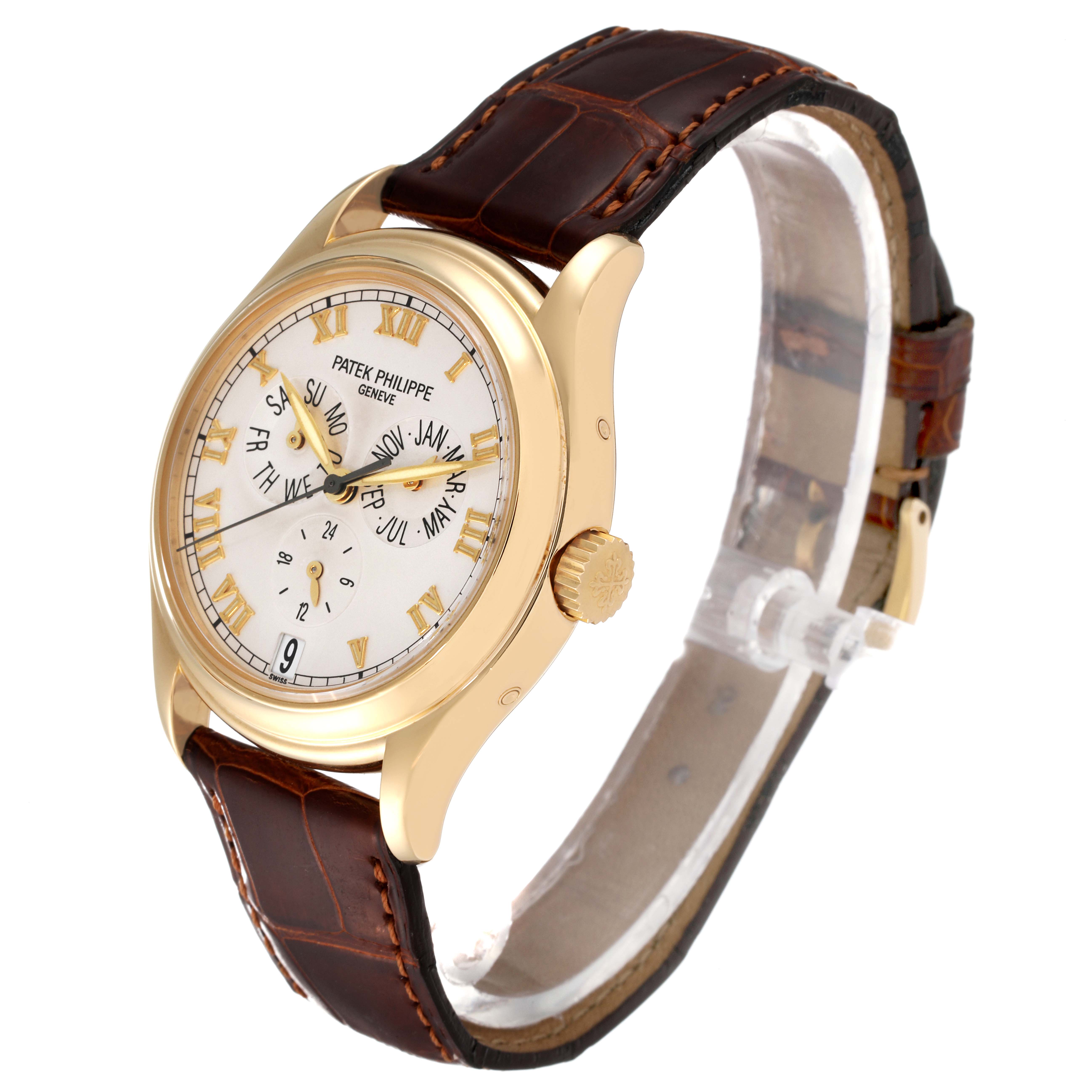 The image shows a Patek Philippe Complications 5035G Men's Yellow Gold Silver Dial 5035G Men's Yellow Gold Silver Dial watch with a gold case, brown leather strap, and white dial featuring date and time functions.