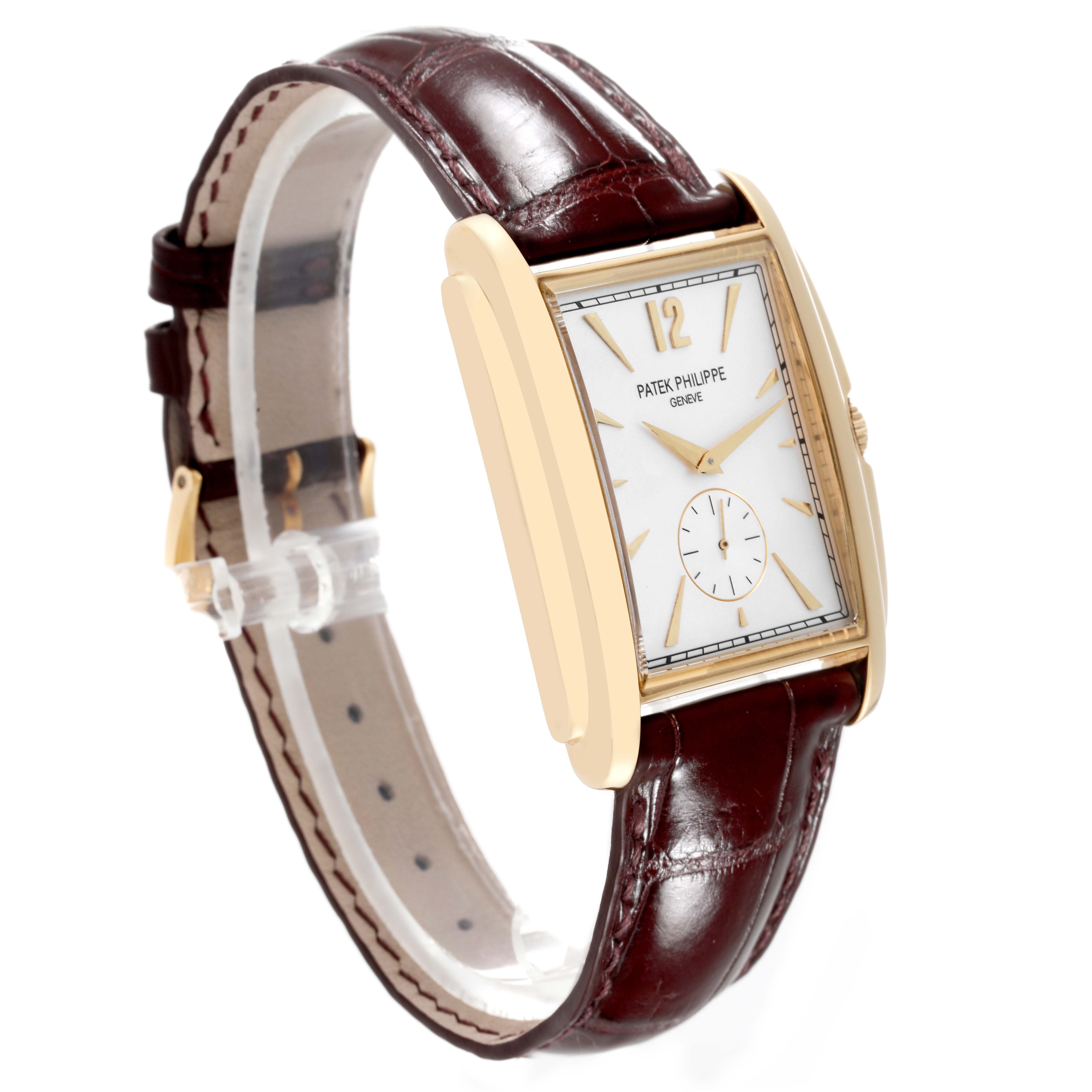 This image shows a side angle of the Patek Philippe Gondolo 5124J Men's Yellow Gold Silver Dial 5124J Men's Yellow Gold Silver Dial watch, highlighting its rectangular dial and leather strap.