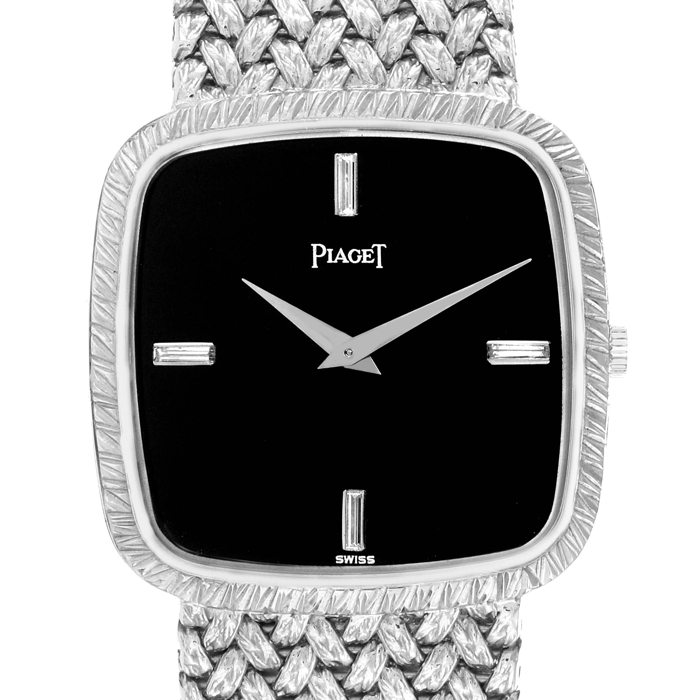 The image shows a front view of the Piaget model 9771D2 men
s watch, highlighting its square face, minimalist markers, and woven bracelet design.
