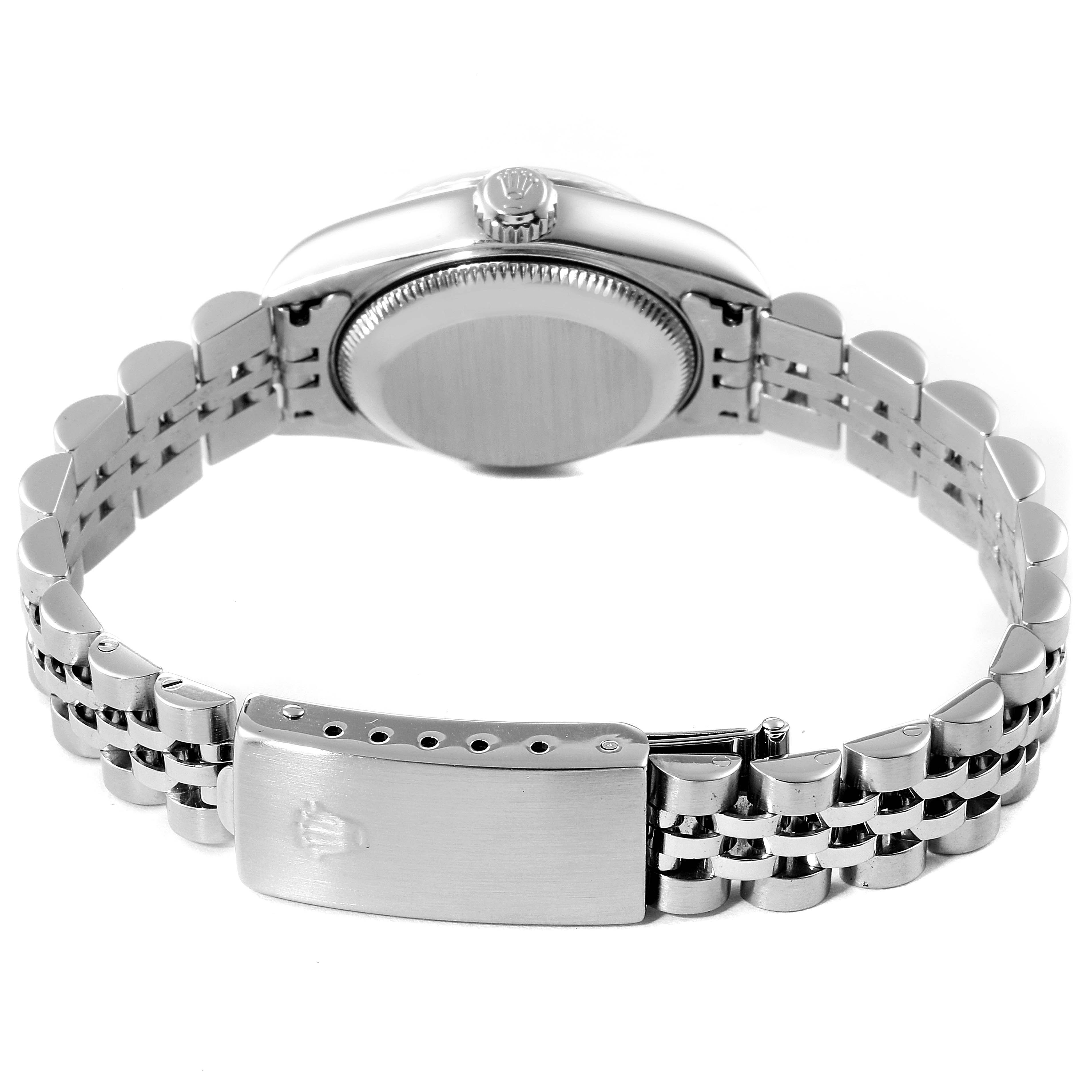 The image shows the back view of a Rolex Datejust 79174 Women
s Stainless Steel Silver Dial 79174 Women
s Stainless Steel Silver Dial watch, focusing on the clasp, bracelet, and case back.