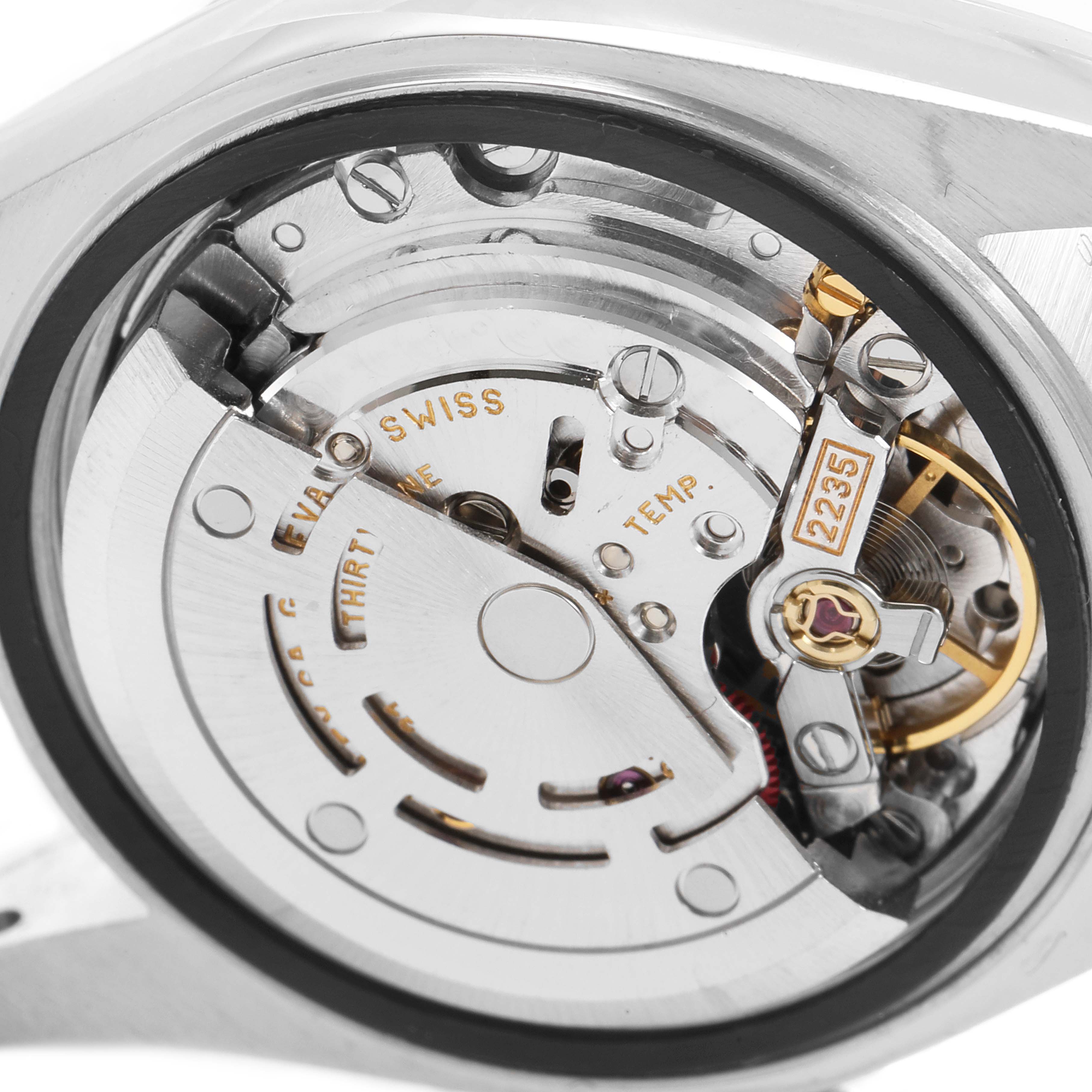 This is a close-up view of the movement inside a Rolex Datejust 79174 Women
s Stainless Steel Silver Dial 79174 Women
s Stainless Steel Silver Dial watch, displaying intricate inner components.