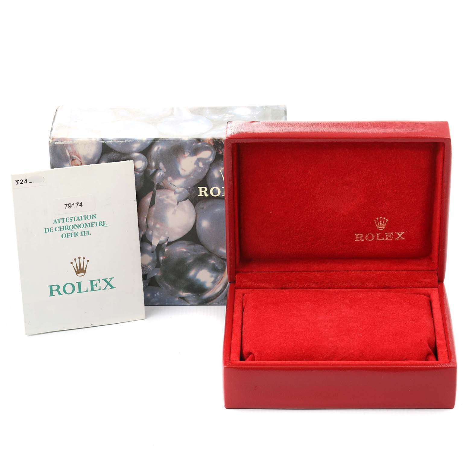 The image shows a Rolex Datejust 79174 Women
s Stainless Steel Silver Dial 79174 Women
s Stainless Steel Silver Dial watch box and booklet, displaying the packaging and documentation from a frontal angle.