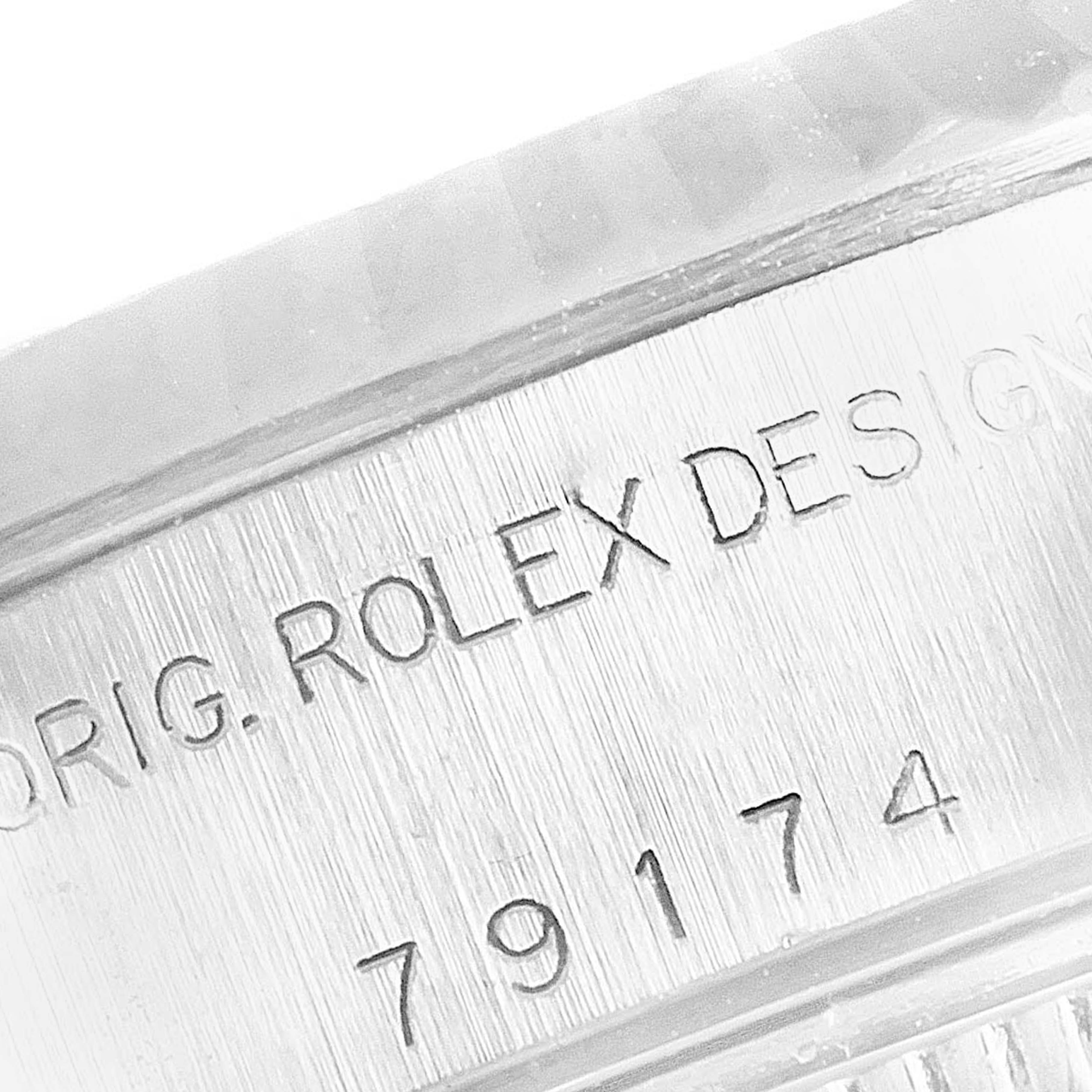 Close-up view of the case side with model number for a Rolex Datejust 79174 Women
s Stainless Steel Silver Dial 79174 Women
s Stainless Steel Silver Dial.