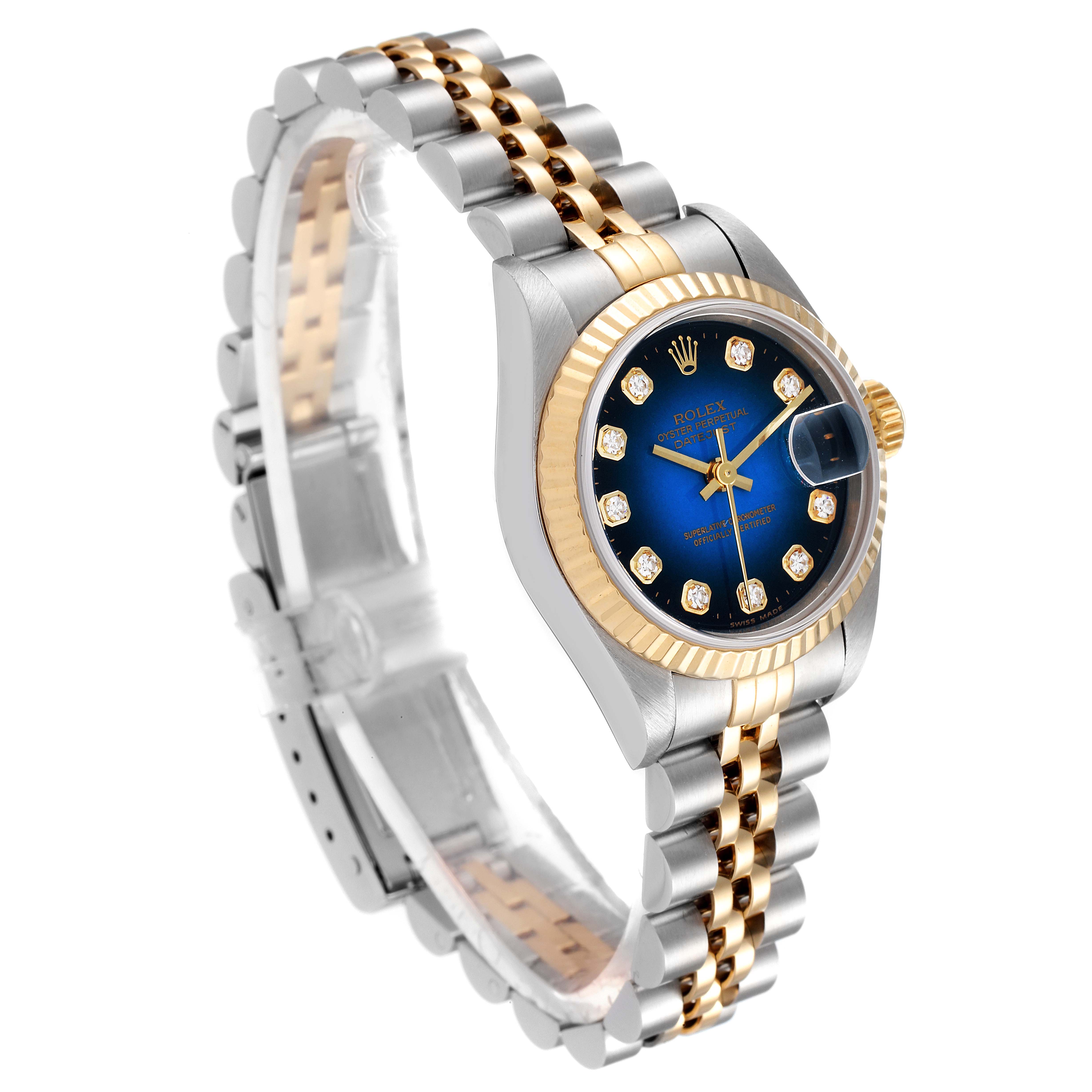 The image shows a Rolex Datejust 69173 Women's Steel and Gold (two tone) Blue Dial 69173 Women's Steel and Gold (two tone) Blue Dial watch at a slight angle, highlighting its blue dial, two-tone bracelet, and gold fluted bezel.