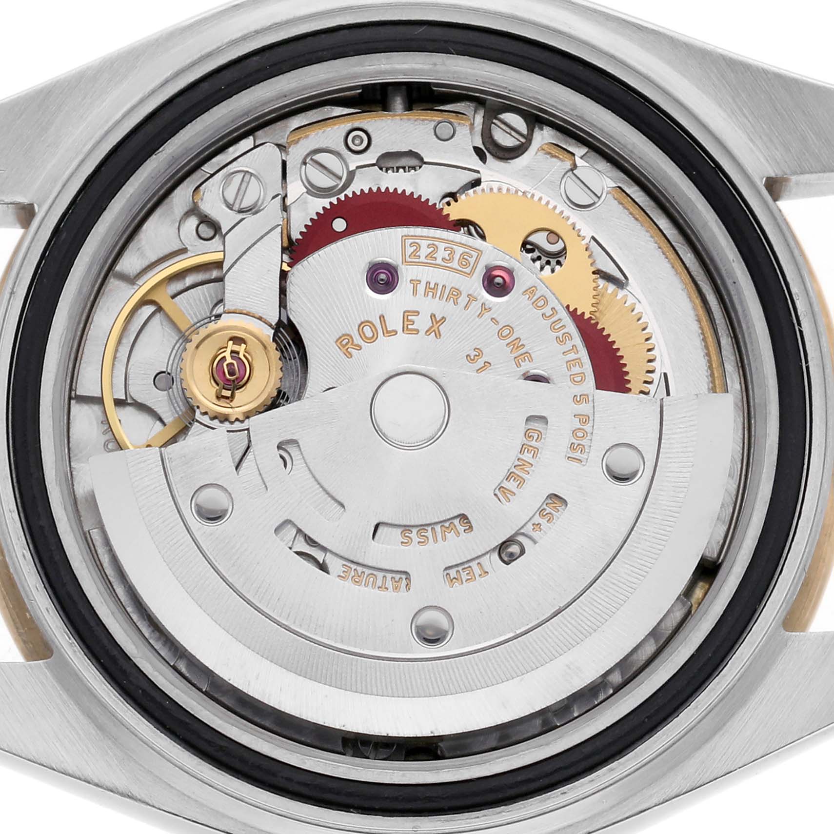 The image shows the movement from the back view of a Rolex Datejust model 279173, featuring the intricate inner mechanics and components.