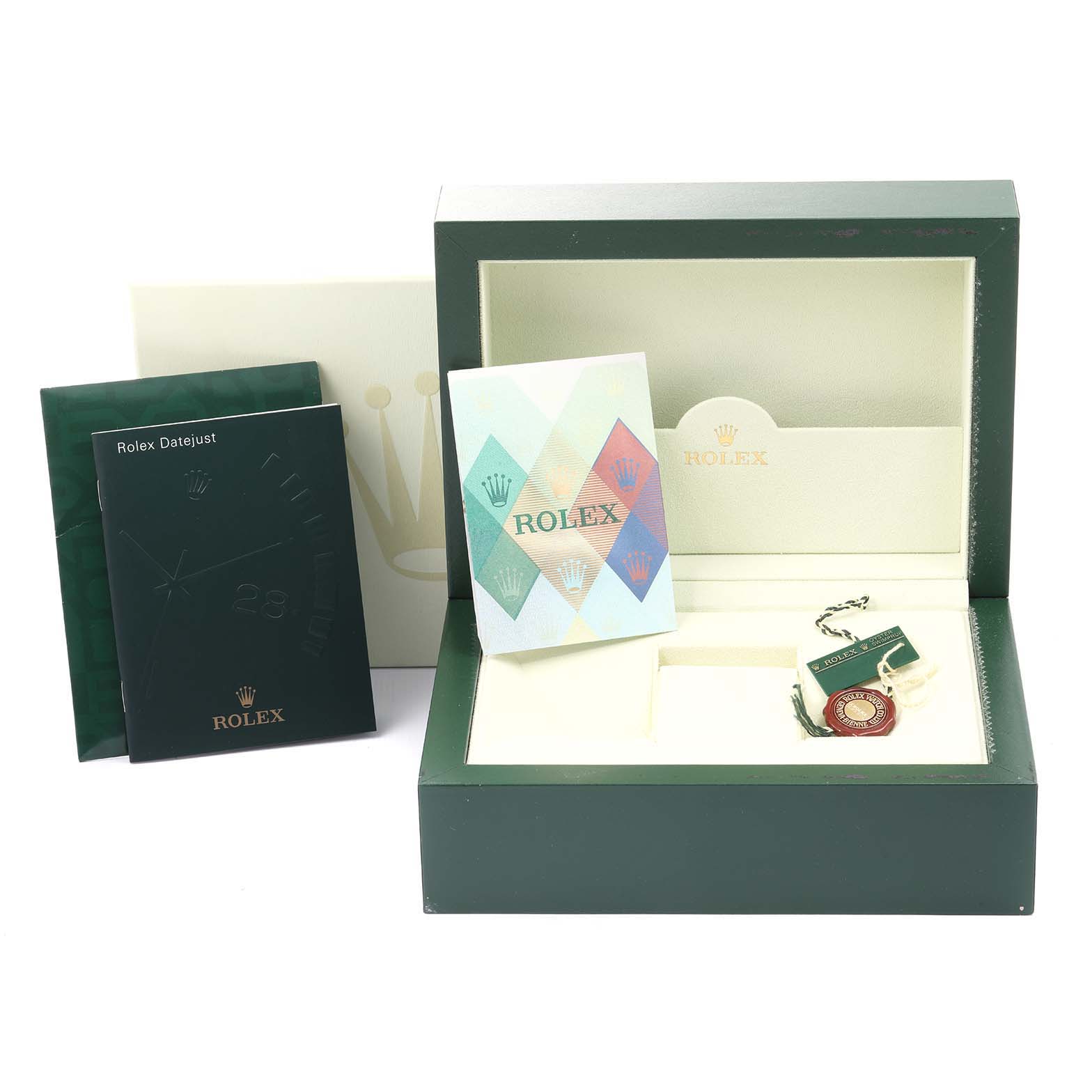 This image shows the packaging and accessories for a Rolex Datejust 116200 Men
s Stainless Steel Black Dial 116200 Men
s Stainless Steel Black Dial watch, including the box, booklets, and tags.