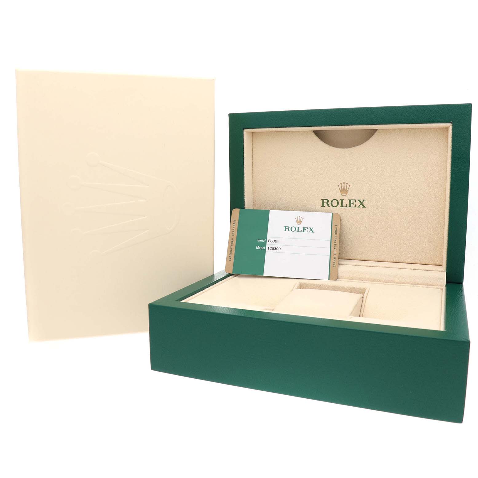 The image shows the open packaging box of a Rolex Datejust 41 126300 Men's Stainless Steel Grey Dial, with the inner cushion and a warranty card visible.