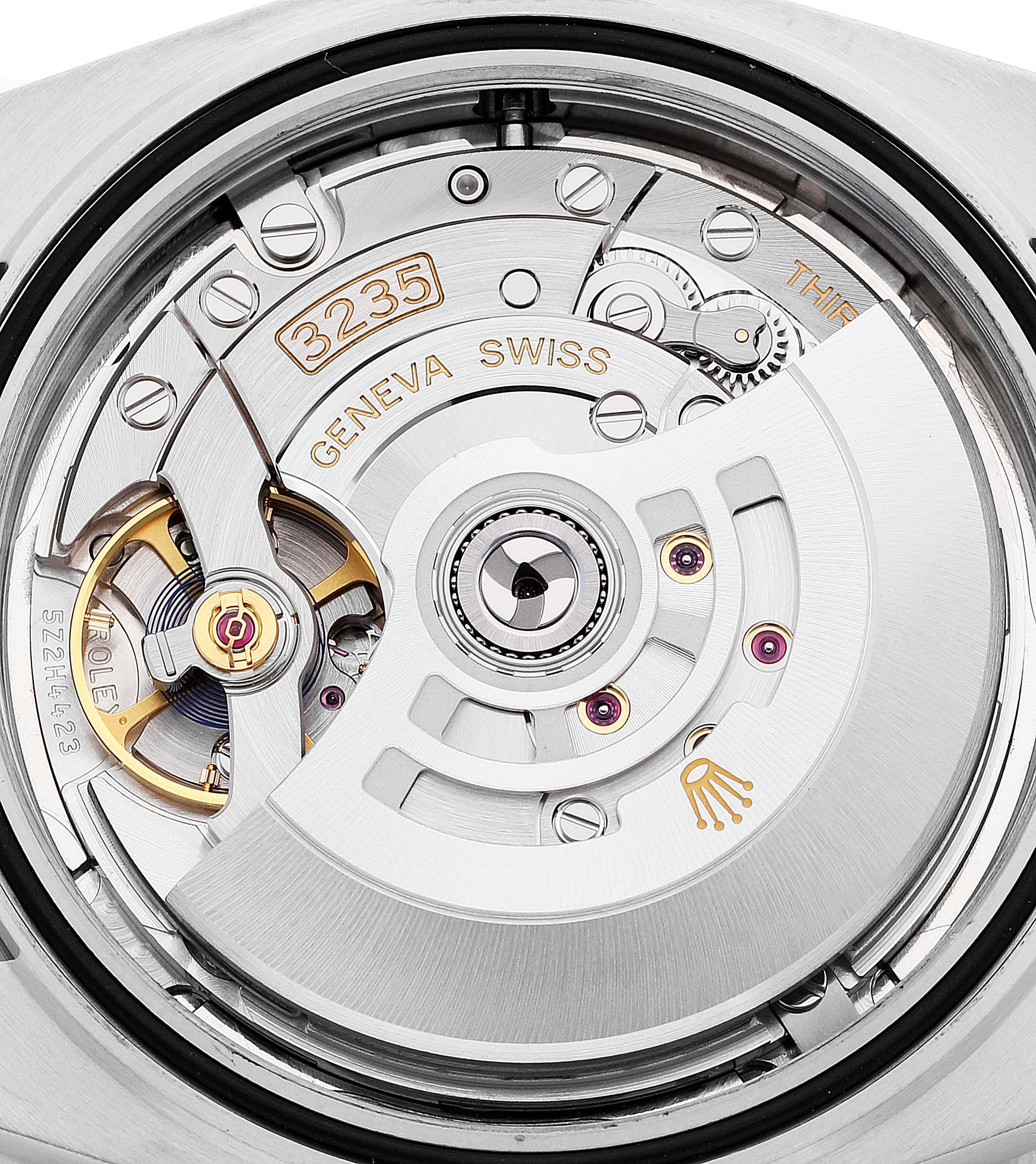 This image shows the intricate movement and internal mechanism of a Rolex Datejust 41 126331 Men's Steel and Gold (two tone) Beige Dial 126331 Men's Steel and Gold (two tone) Beige Dial model.