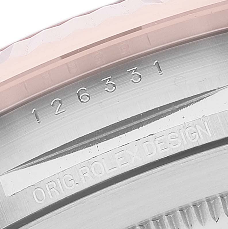 This image shows a close-up of the case side of a Rolex Datejust 41 126331 Men's Steel and Gold (two tone) Beige Dial 126331 Men's Steel and Gold (two tone) Beige Dial, revealing the model number 126331 and original design engraving.