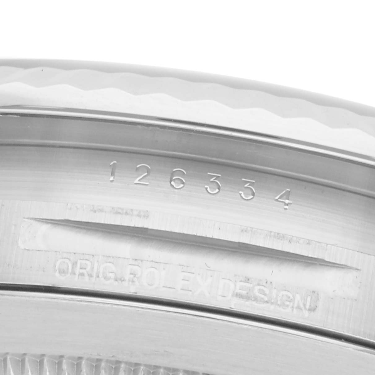 The image shows a close-up view of the Rolex Datejust 41, model number 126334, focusing on the engraved model number and design details on the watch case side.
