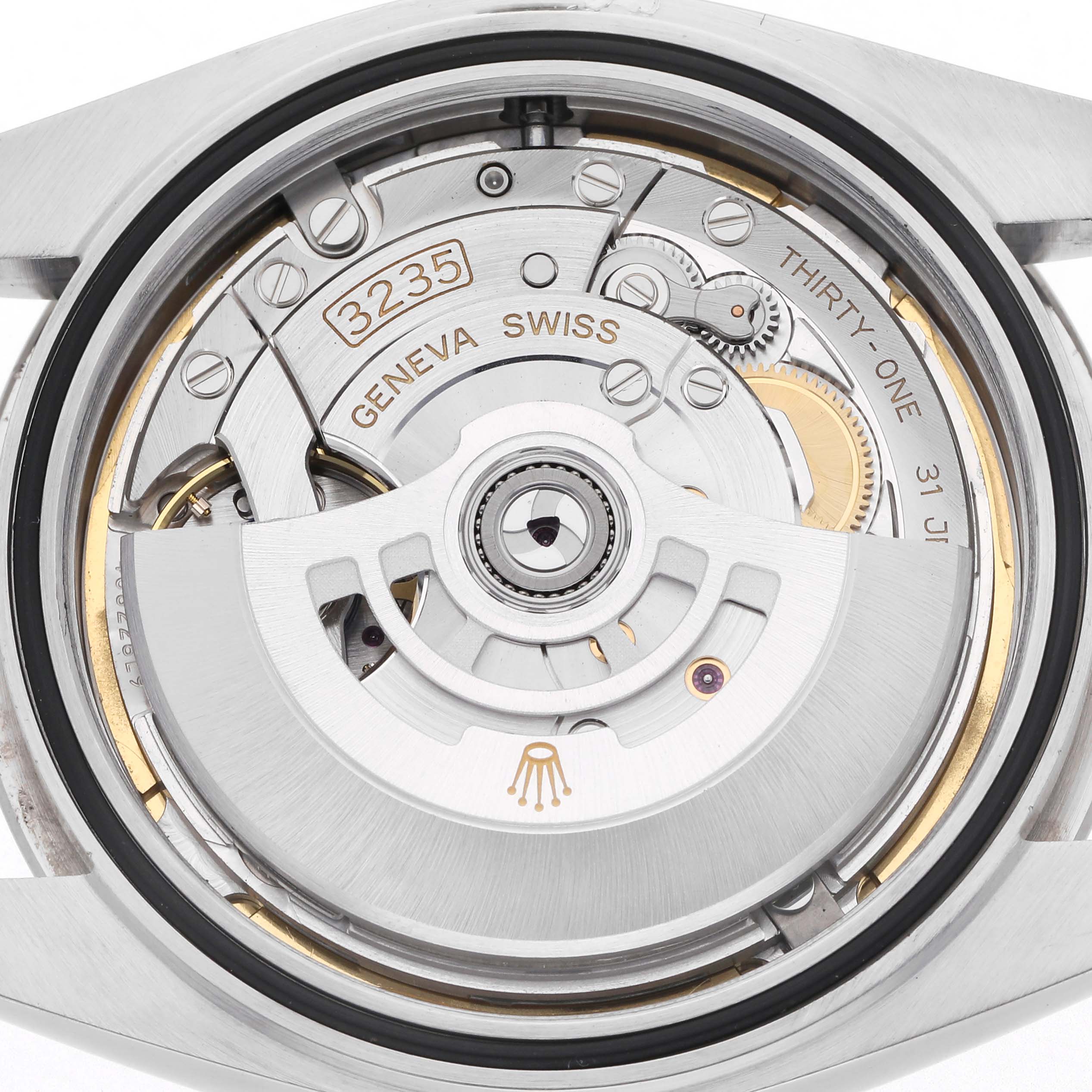 The image shows the movement of a Rolex Datejust 41, model number 126334, highlighting the intricate internal mechanics from a back angle.