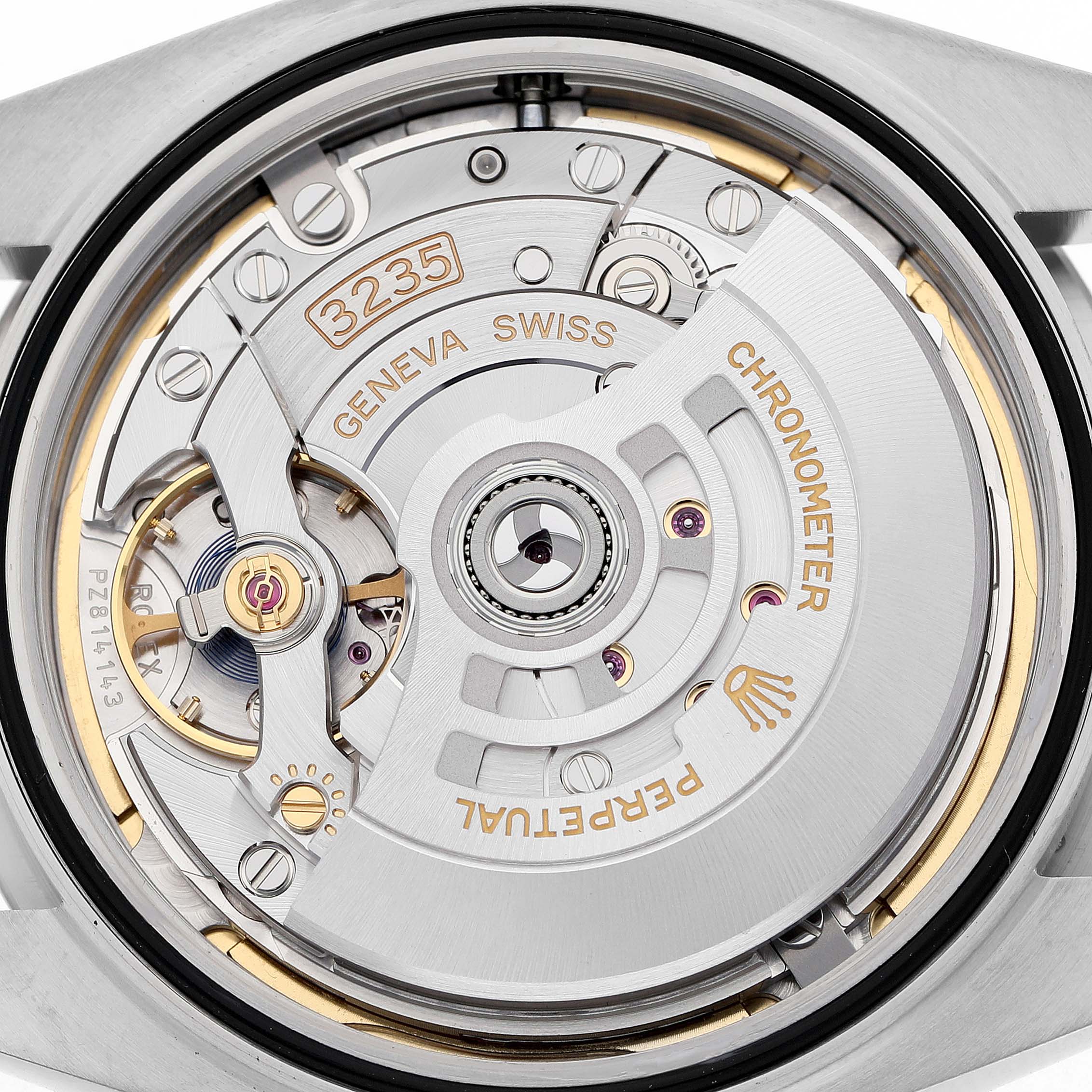 The image shows the movement of a Rolex Datejust 41 126334 Men's Stainless Steel Green Dial, highlighting the 3235 mechanism from a rear angle.