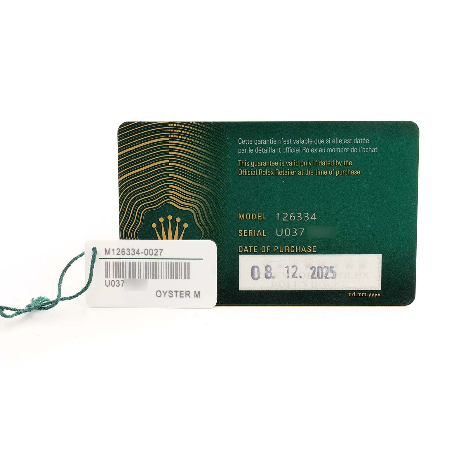 The image shows a warranty card and tag for the Rolex Datejust 41 126334 Men's Stainless Steel Green Dial model, displaying model and serial numbers.