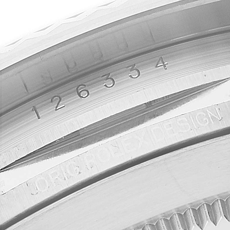 This close-up shows the model number engraved on the inner bezel of a Rolex Datejust 41 126334 Men's Stainless Steel White Dial 126334 Men's Stainless Steel White Dial watch.