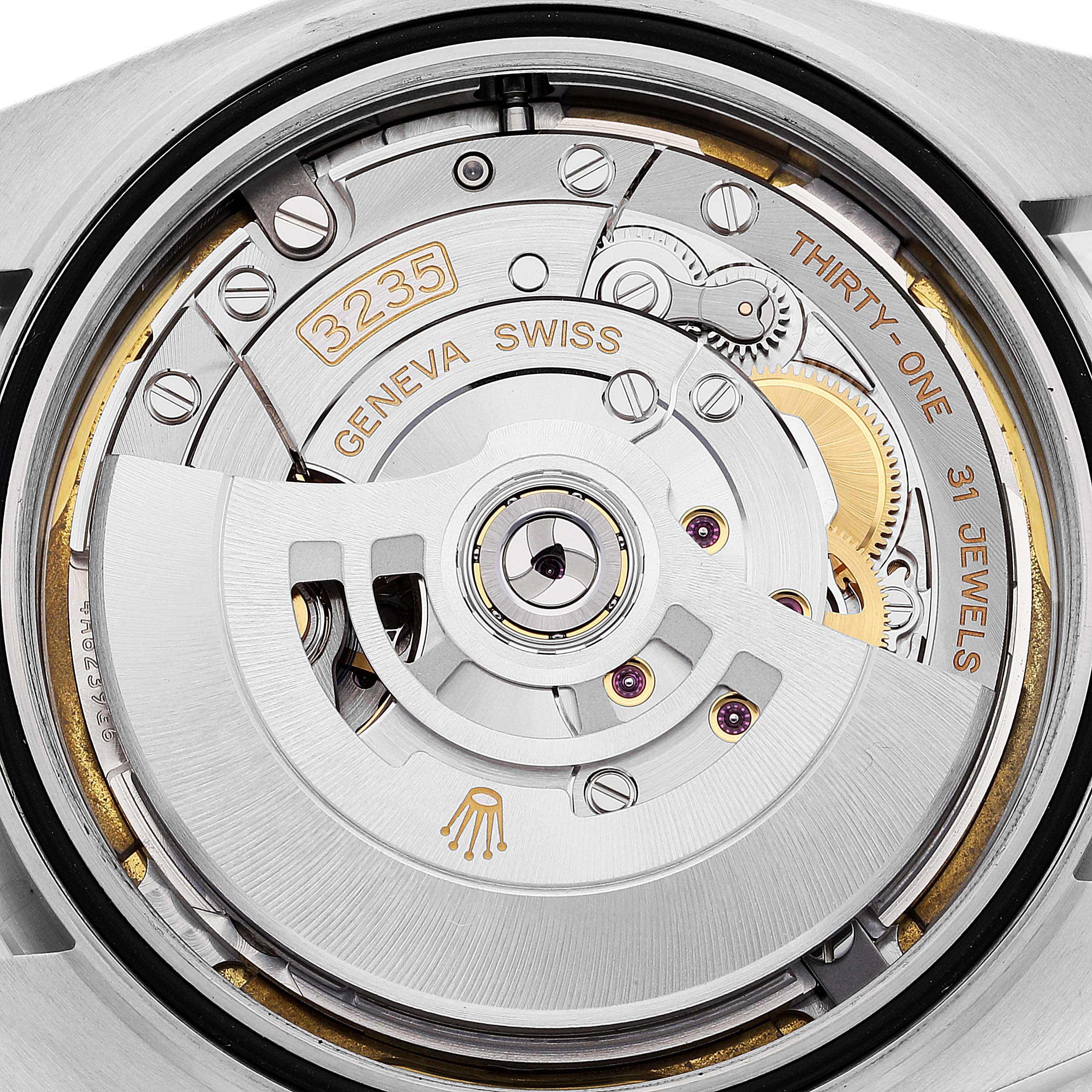 The image shows the movement mechanism of a Rolex Datejust 41 126300 Men's Stainless Steel White Dial 126300 Men's Stainless Steel White Dial watch, highlighting the intricate components inside.