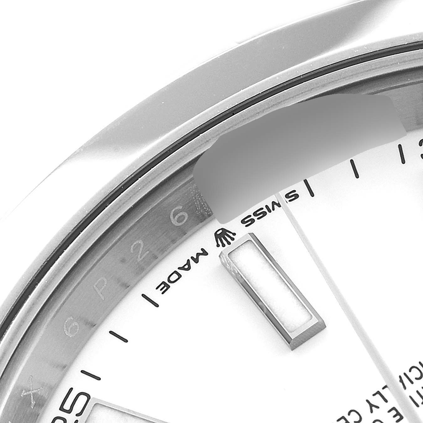 This image shows a close-up of the dial and bezel of the Rolex Datejust 41 126300 Men's Stainless Steel White Dial 126300 Men's Stainless Steel White Dial, highlighting the "SWISS MADE" text and part of an hour marker.