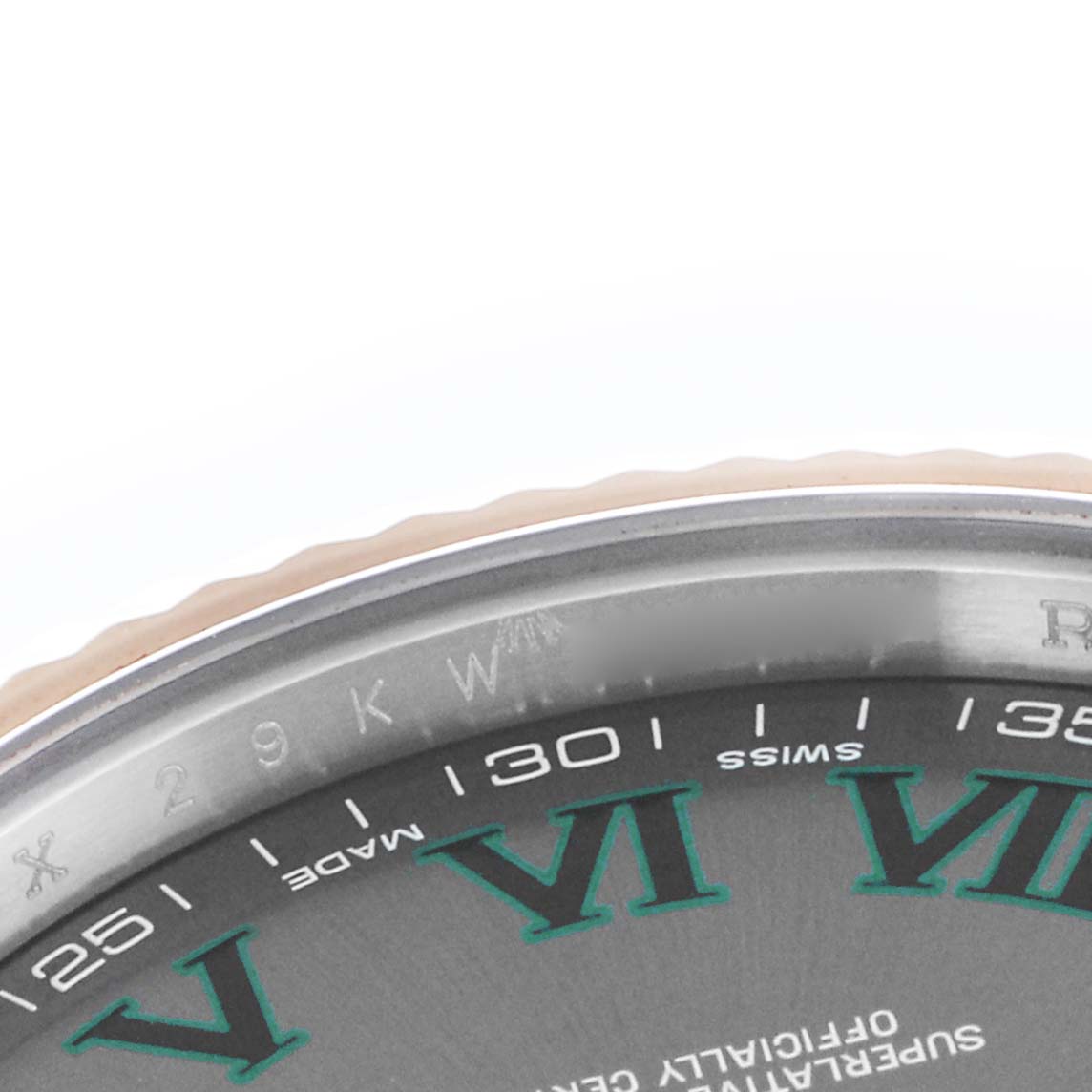 The image shows a close-up of the Rolex Datejust 41 model 116333's dial edge, focusing on Roman numerals and minute markers.