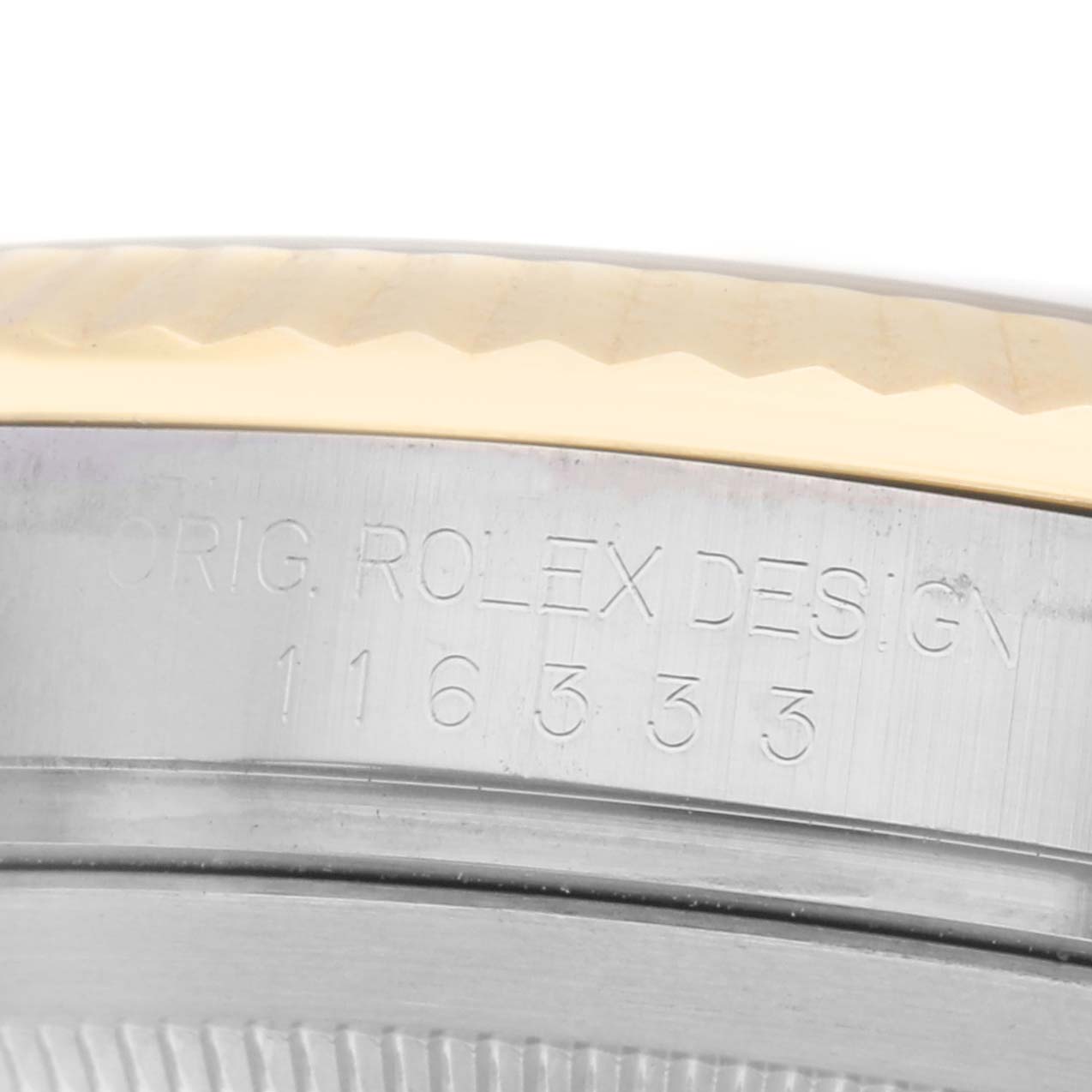 The image shows a close-up of the side of a Rolex Datejust 41, model 116333, showcasing the engraved text on the case.