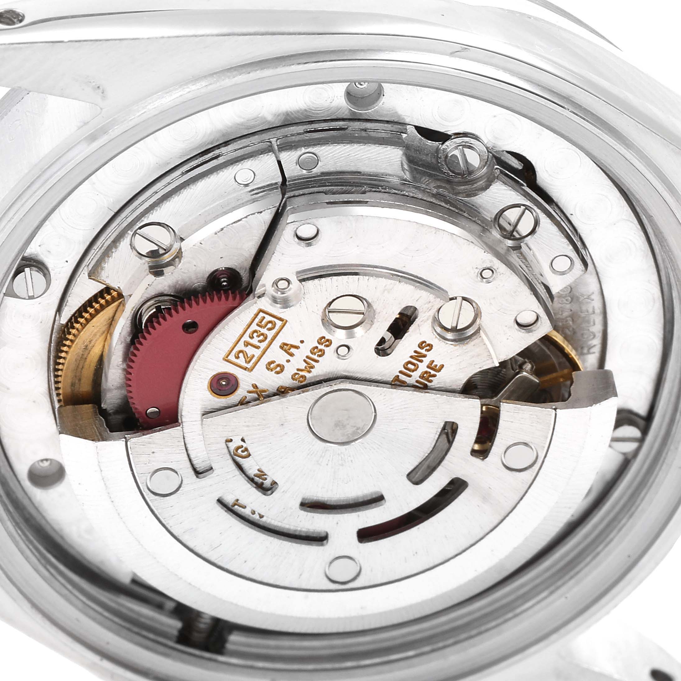 This image shows the internal mechanical movement of a Mid-Size Rolex watch, specifically highlighting the components of the calibre 2135.