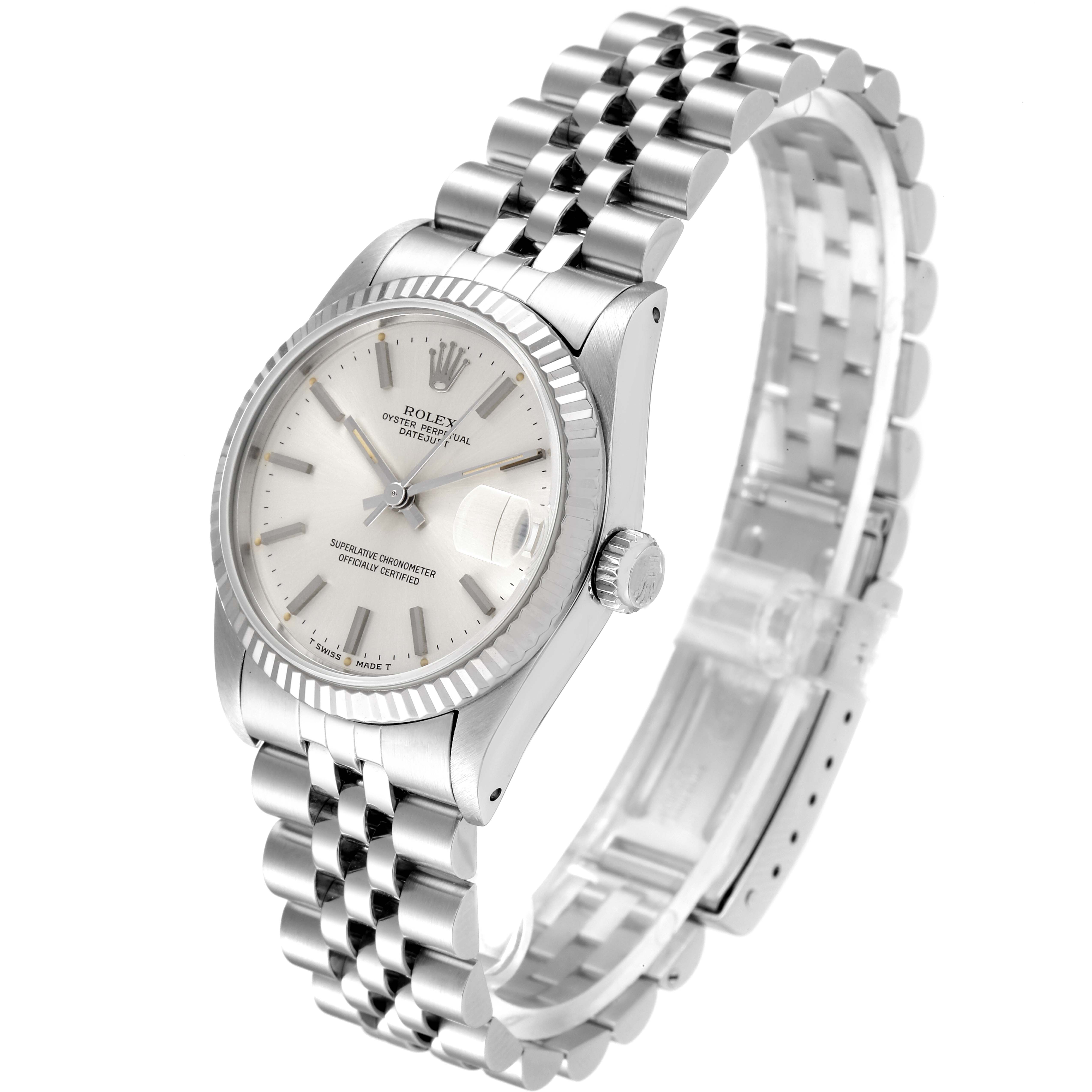 This image shows a side angle view of a Mid-Size Rolex watch featuring its face, crown, and jubilee bracelet.