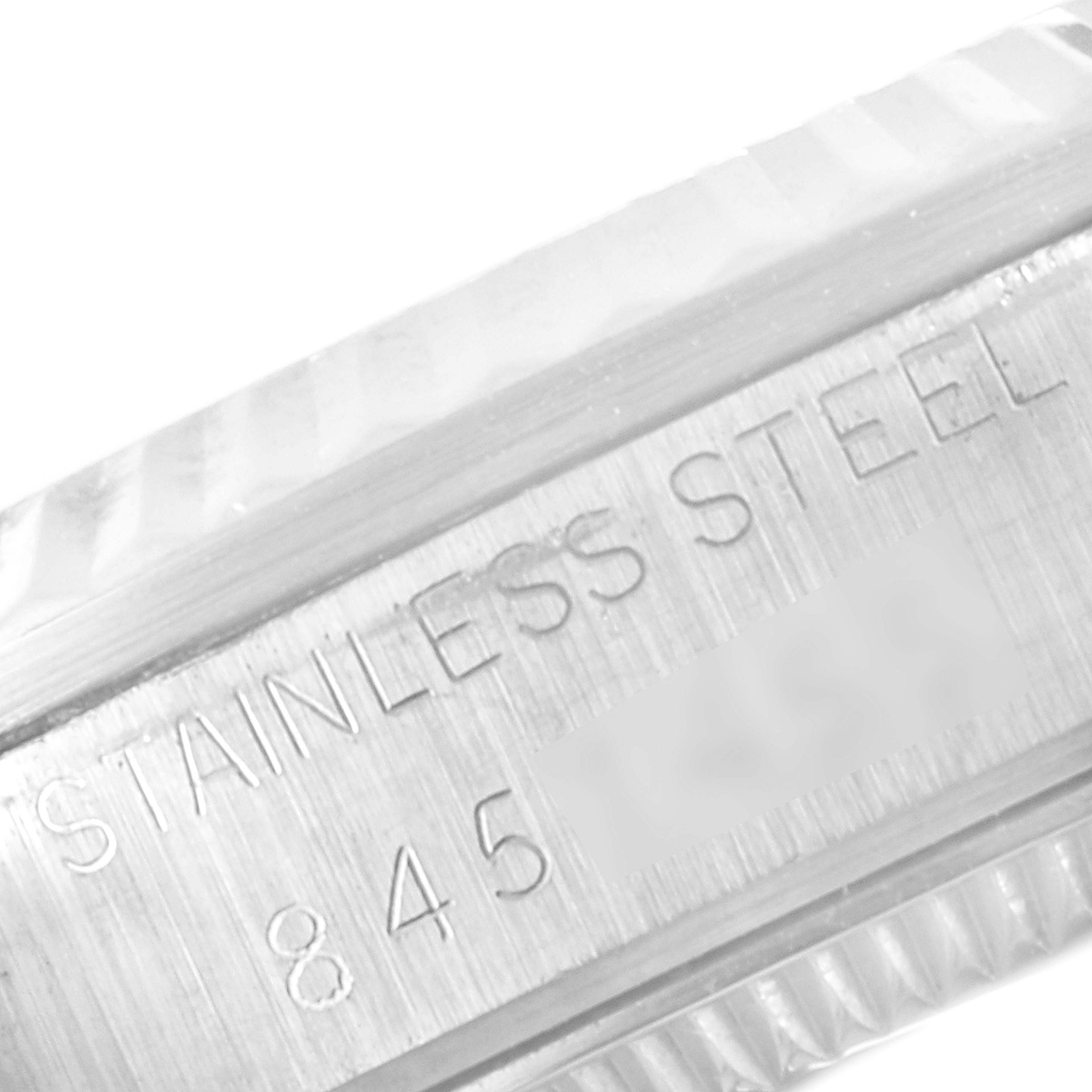 This image shows the inner rim of a stainless steel bezel on a Rolex Mid-Size 68274 Women
s Stainless Steel Silver Dial 68274 Women
s Stainless Steel Silver Dial model.