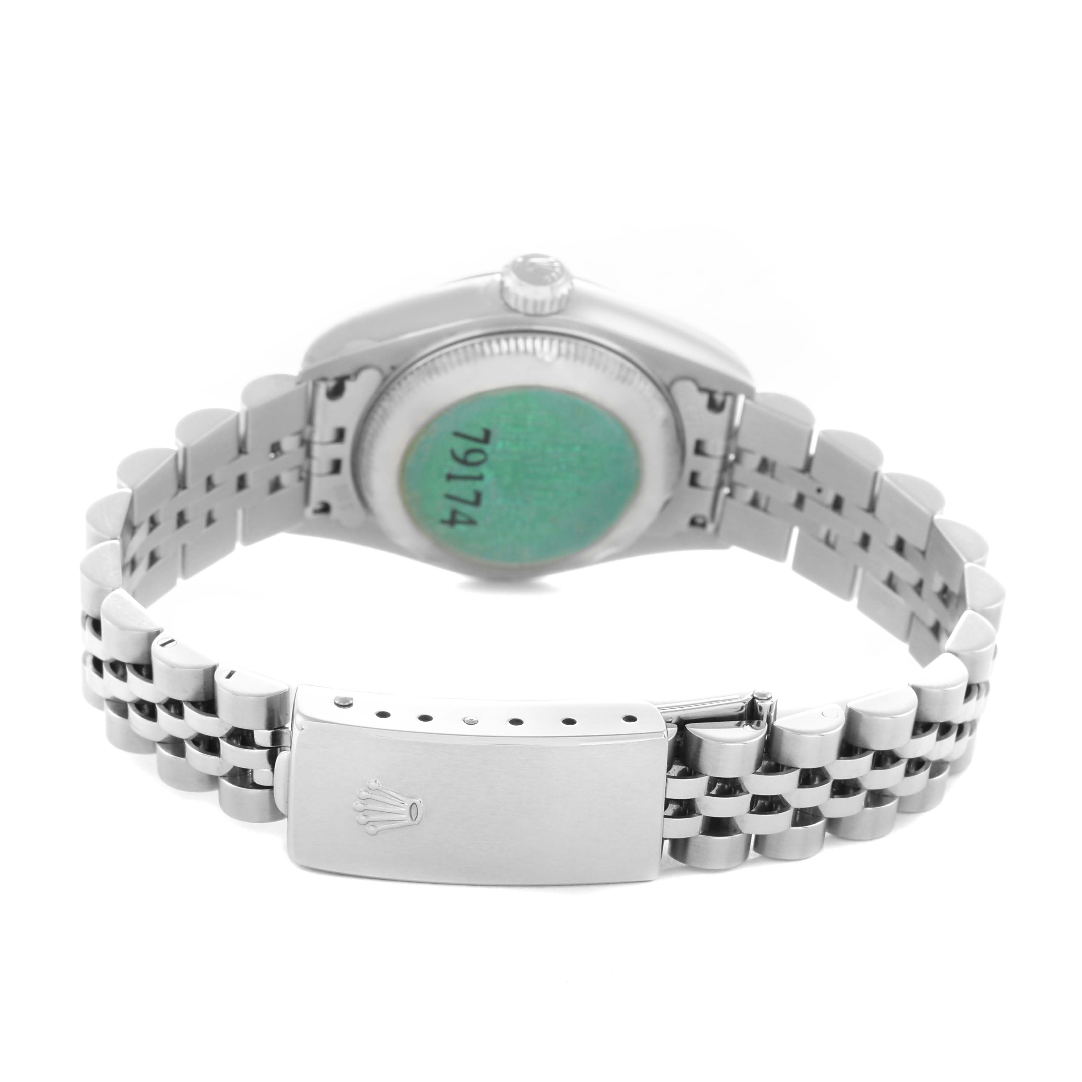 The image shows the back view of a Rolex Datejust model 79174 watch, featuring the case back, bracelet, and clasp with the Rolex logo.