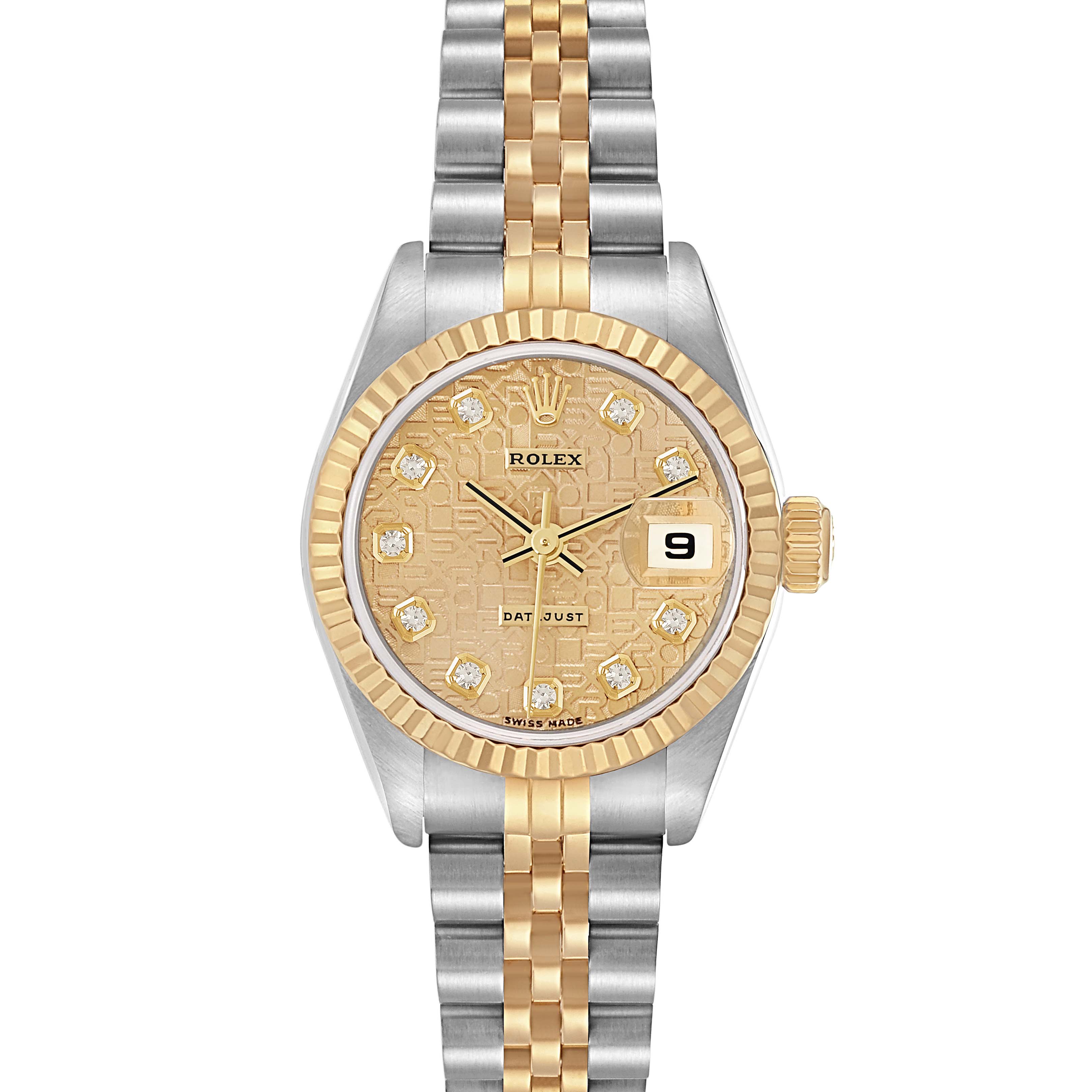 The Rolex Datejust model 79173 is shown from a front angle featuring its dial, bezel, case, crown, and two-tone bracelet.