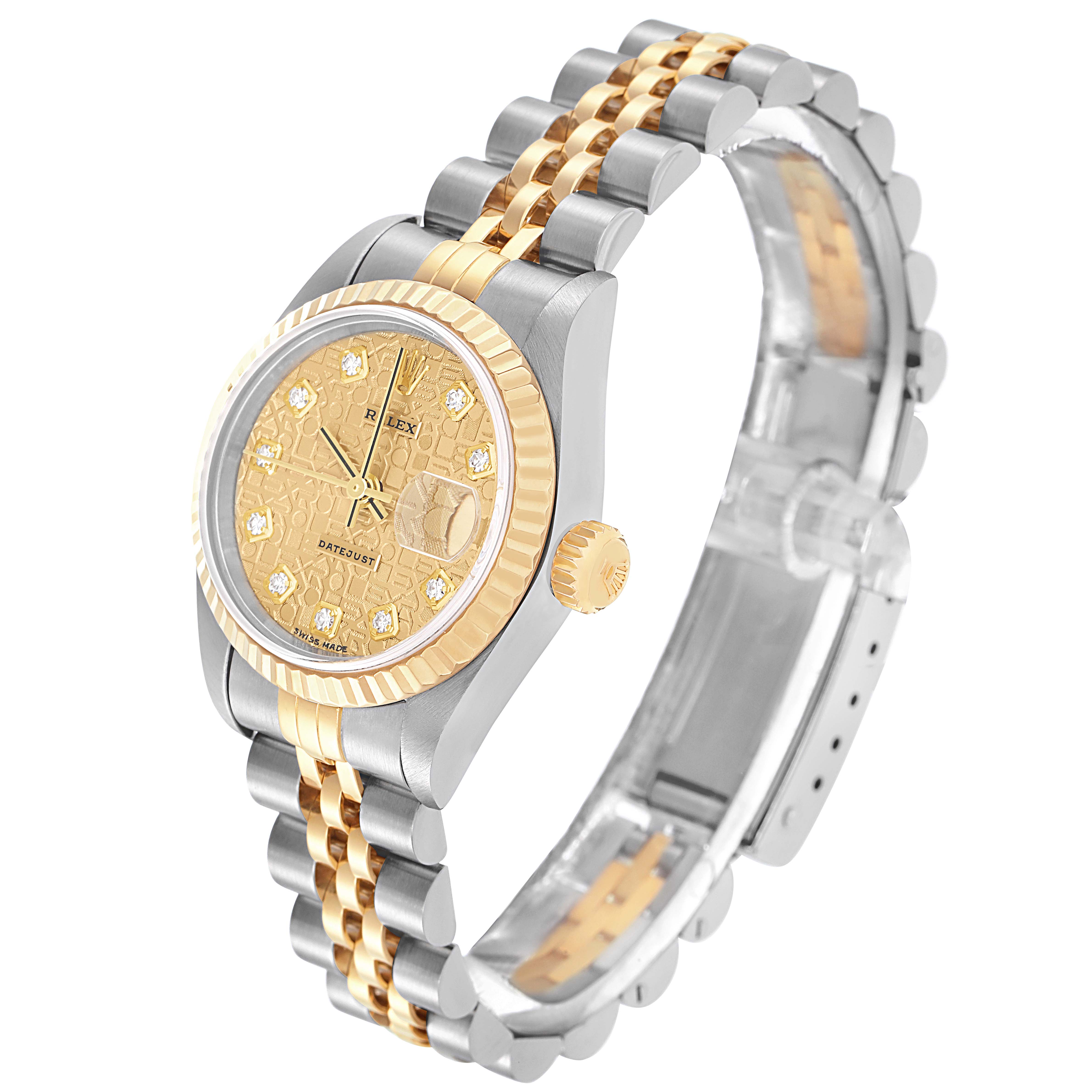 The Rolex Datejust model 79173 is shown at a three-quarter angle, highlighting its gold bezel, crown, and two-tone bracelet.