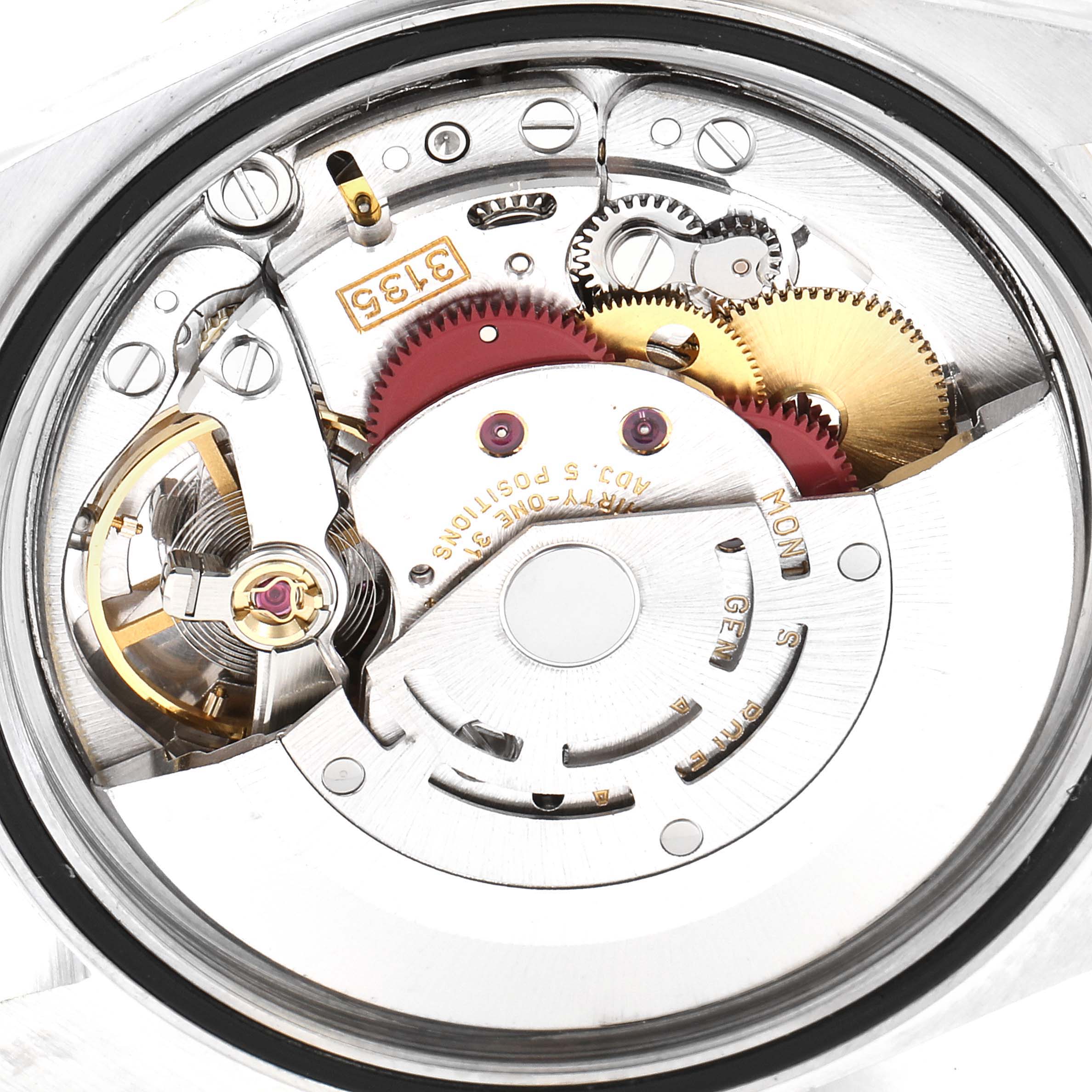 This is a close-up view of the movement mechanism inside a Rolex Datejust 16233 Men's Steel and Gold (two tone) Blue Dial 16233 Men's Steel and Gold (two tone) Blue Dial watch.