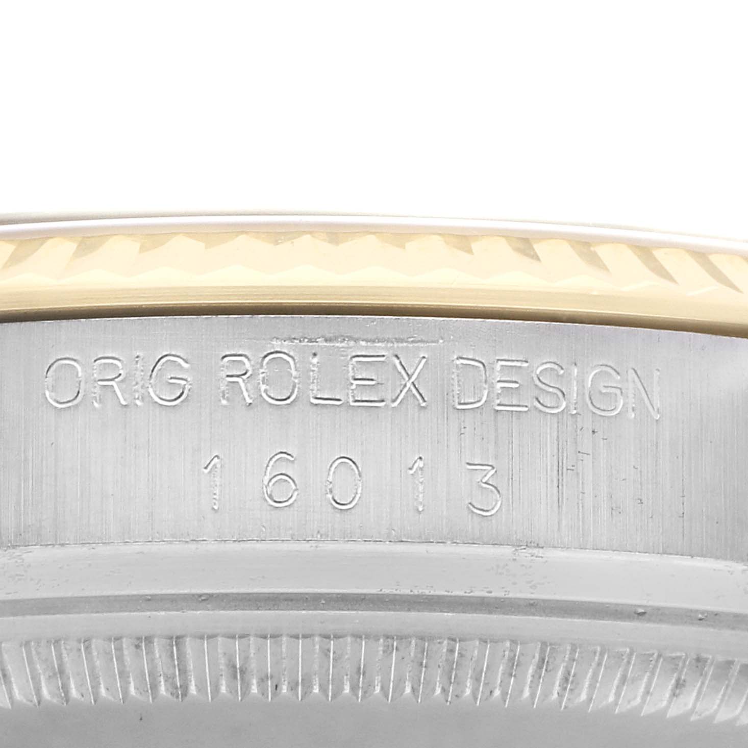The image shows a close-up of the side of the Rolex Vintage Collection watch, model number 16013, focusing on the engraved model number and part of the bezel.