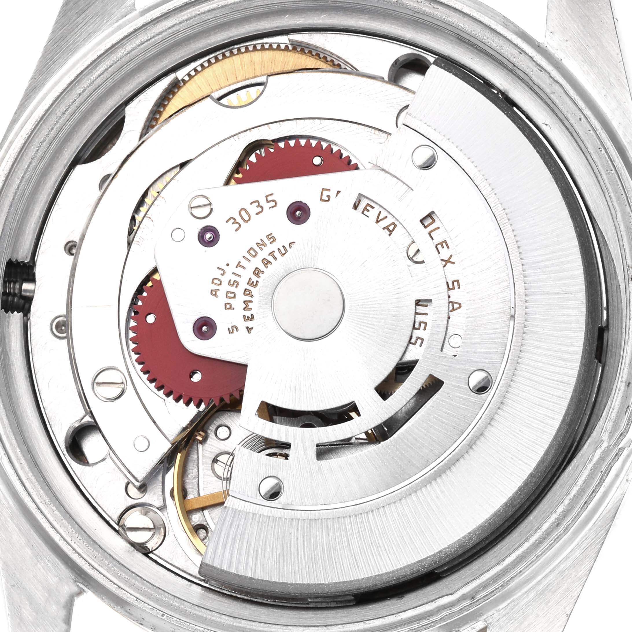 The image shows an inside view of the Rolex Vintage Collection model 16013, highlighting the movement mechanism and gears.
