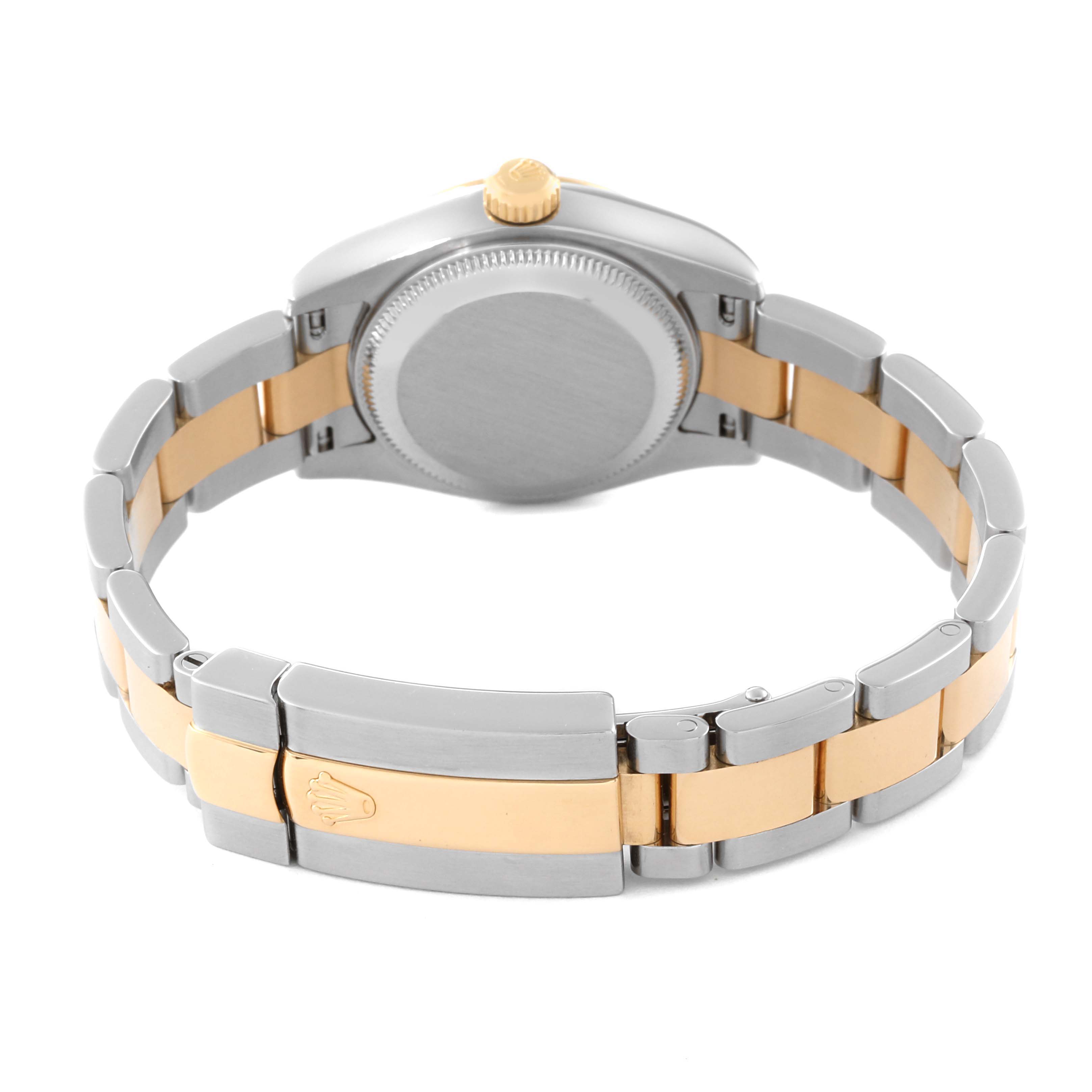 The image shows the backside and clasp of the Rolex Datejust 179163 Women
s Steel and Gold (two tone) White Dial 179163 Women
s Steel and Gold (two tone) White Dial watch, highlighting its two-tone bracelet and case back.