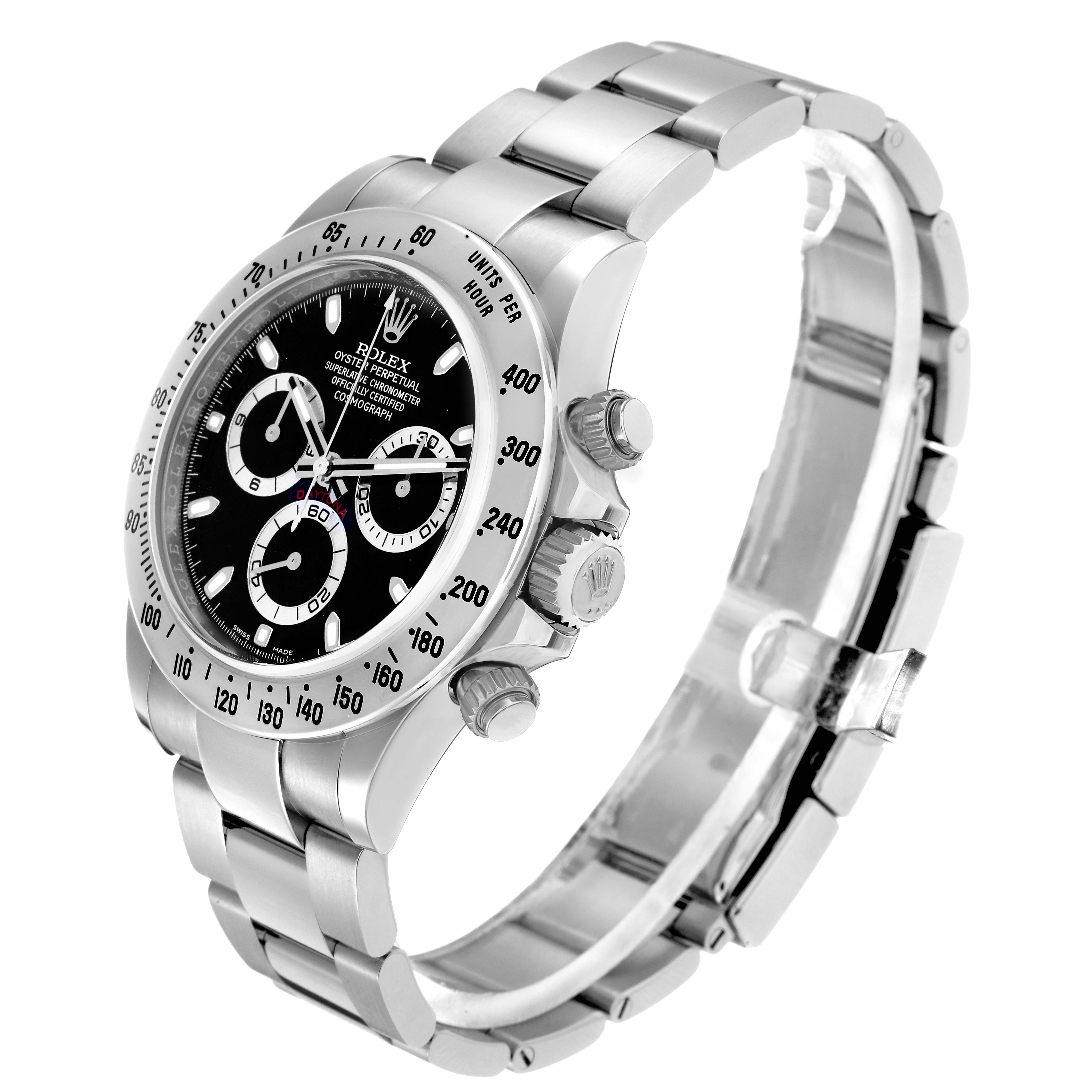 The image shows a Rolex Daytona model 116520 men
s watch at an angled view, highlighting the bezel, dial, chronograph subdials, crown, and stainless steel bracelet.