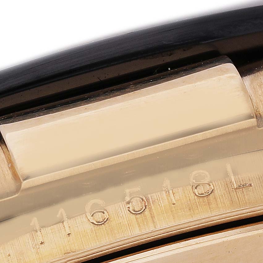 The image shows a close-up of the side of a Rolex Daytona 116518LN Men's Yellow Gold Champagne Dial, focusing on the case with visible model numbers engraved.