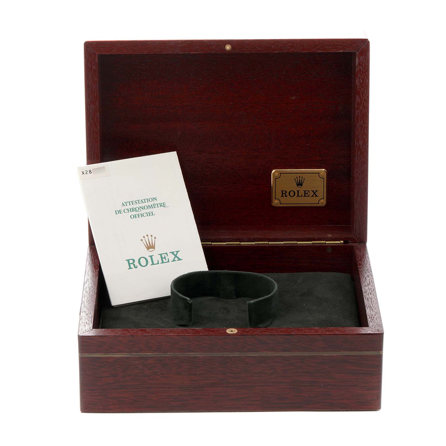 The image shows an open wooden Rolex box for a Daytona model 16518, with a watch cushion and a certificate booklet inside.