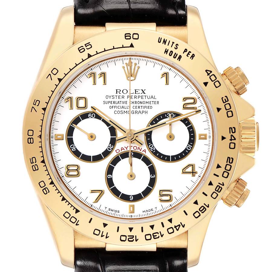 The Rolex Daytona model 16518 is shown from a frontal angle, highlighting its gold case, white dial, and black subdials with a black leather strap.