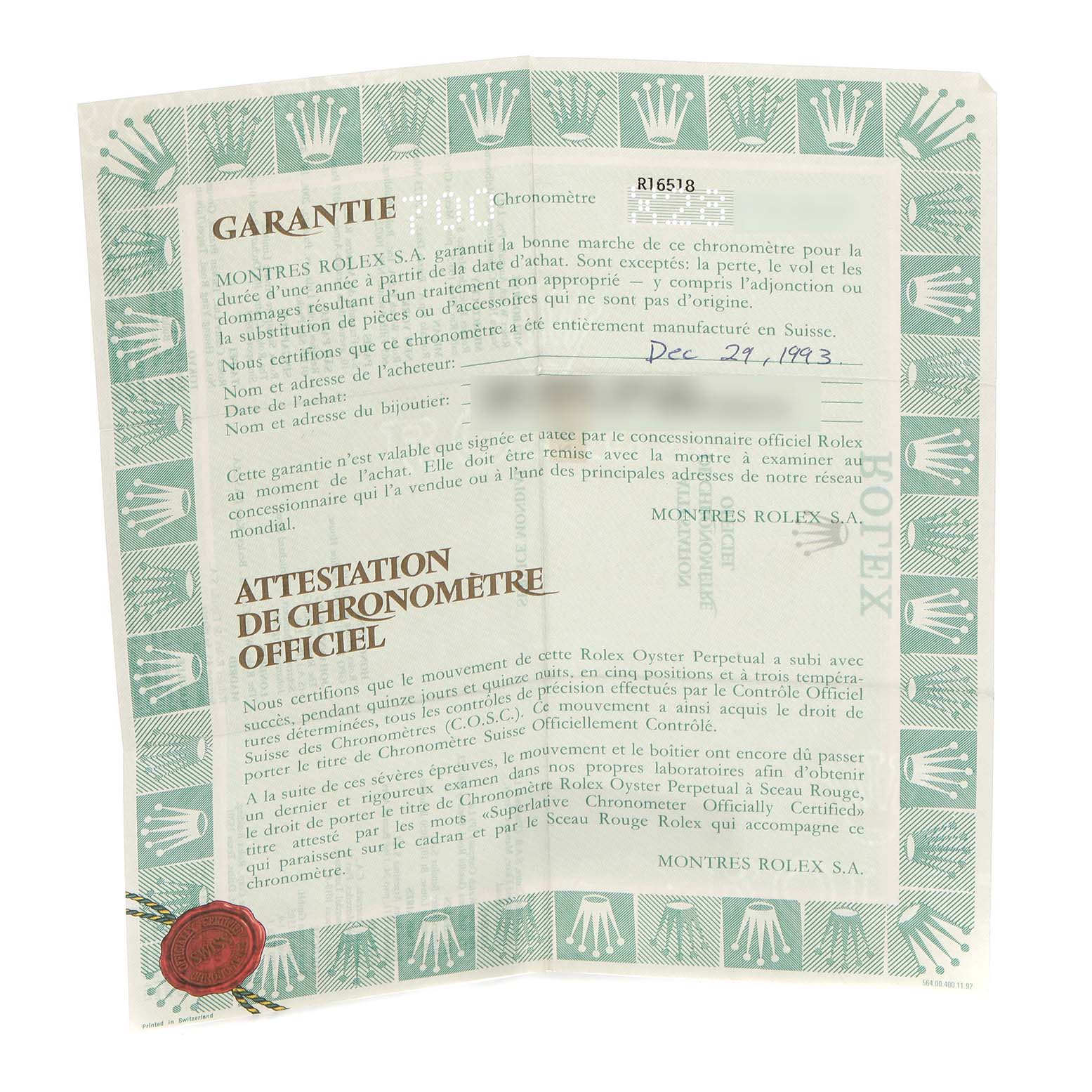 The image shows a warranty document for a Rolex Daytona, model number 16518, with the branding and text visible.