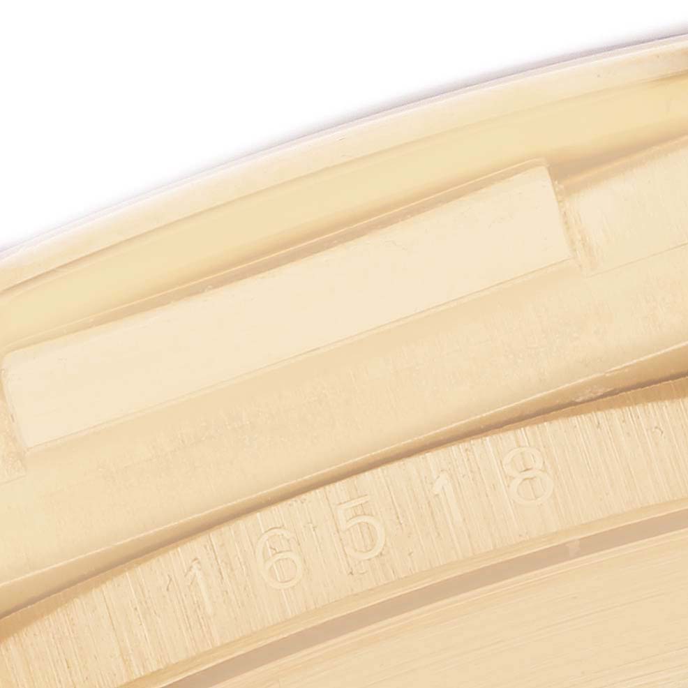 The image shows a close-up of the case edge with the model number "16518" engraved, part of the Rolex Daytona men's watch.