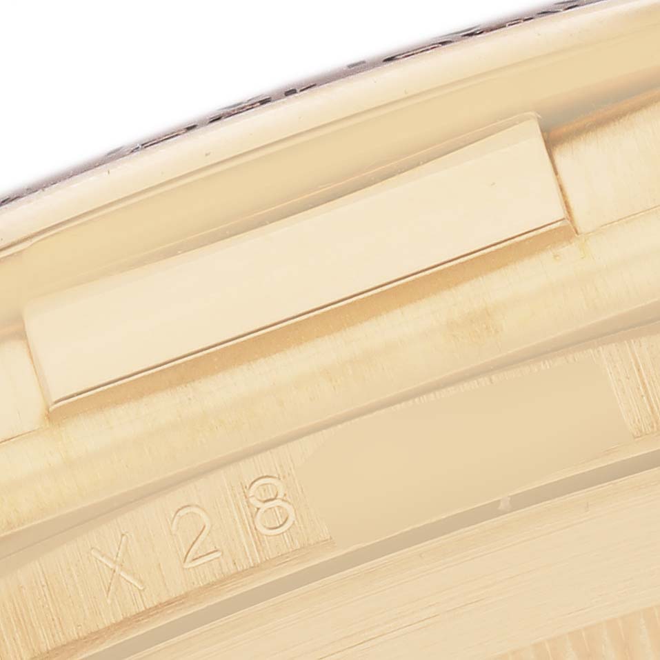 This image shows a close-up of the edge and part of the casing for the Rolex Daytona model 16518 men's watch.