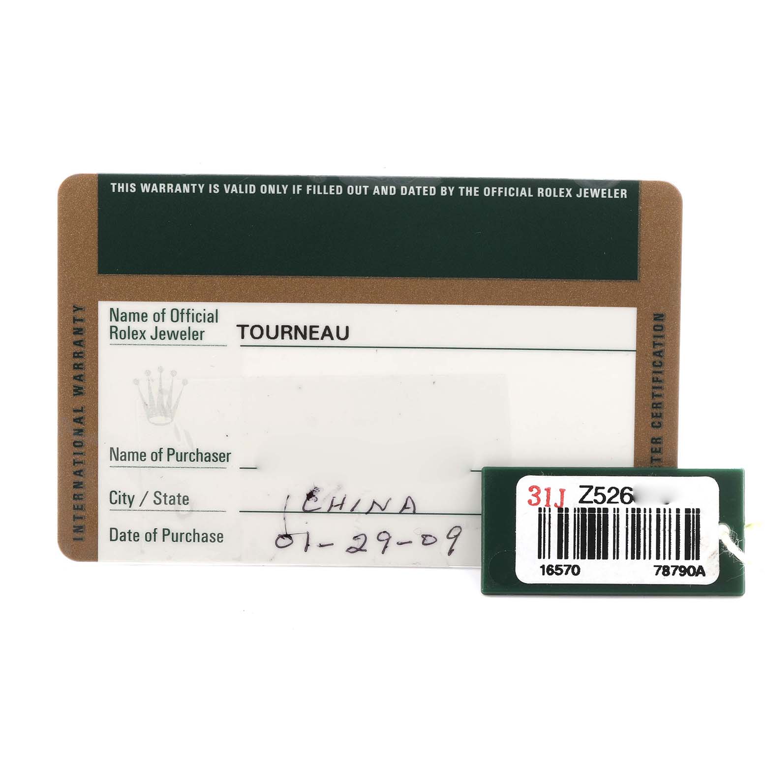 The image shows a warranty card and a tag for a Rolex Explorer model, model number 16570, including dealer information and purchase date.