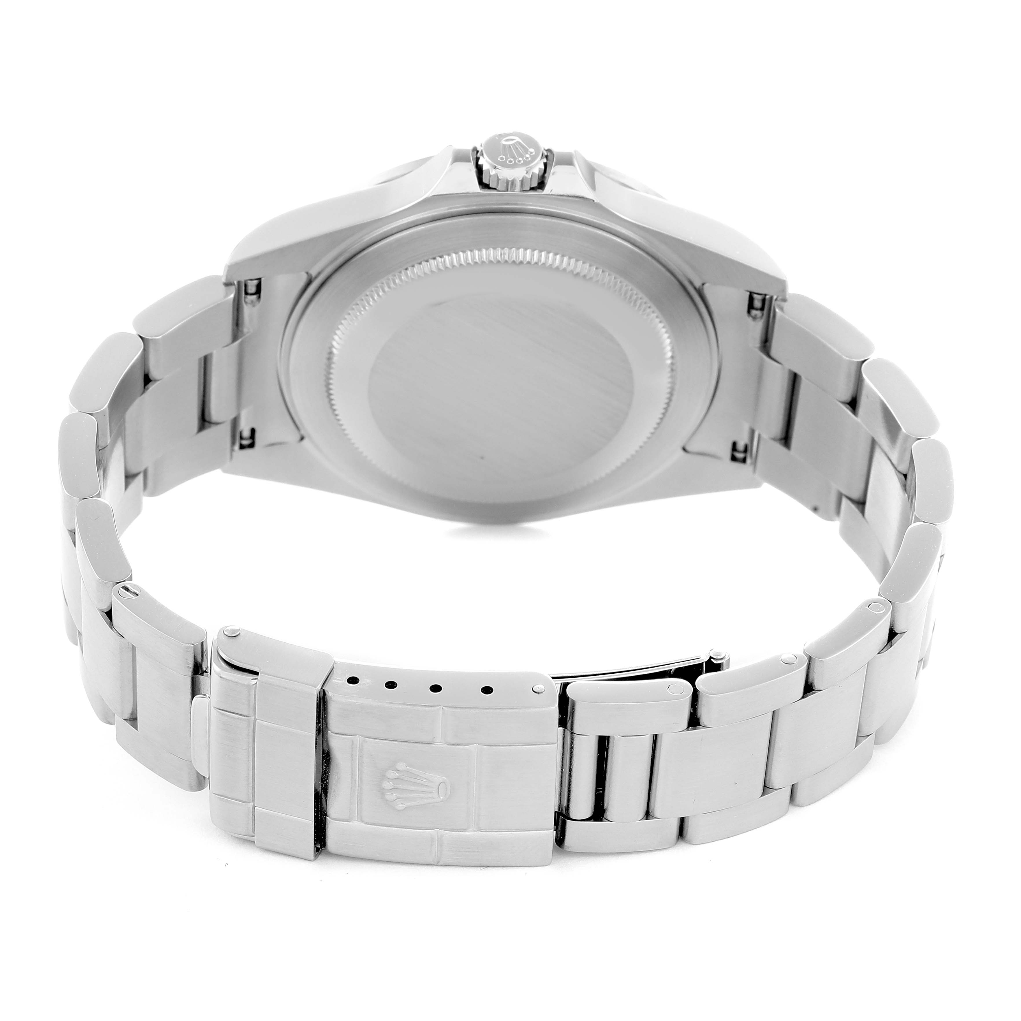 The image shows the back view of a Rolex Explorer, model 16570, highlighting the case back, bracelet, and clasp.