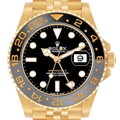 The Rolex GMT-Master 126718GRNR Men's Yellow Gold Black Dial II watch is shown from the front, highlighting the bezel, dial, and part of the bracelet.