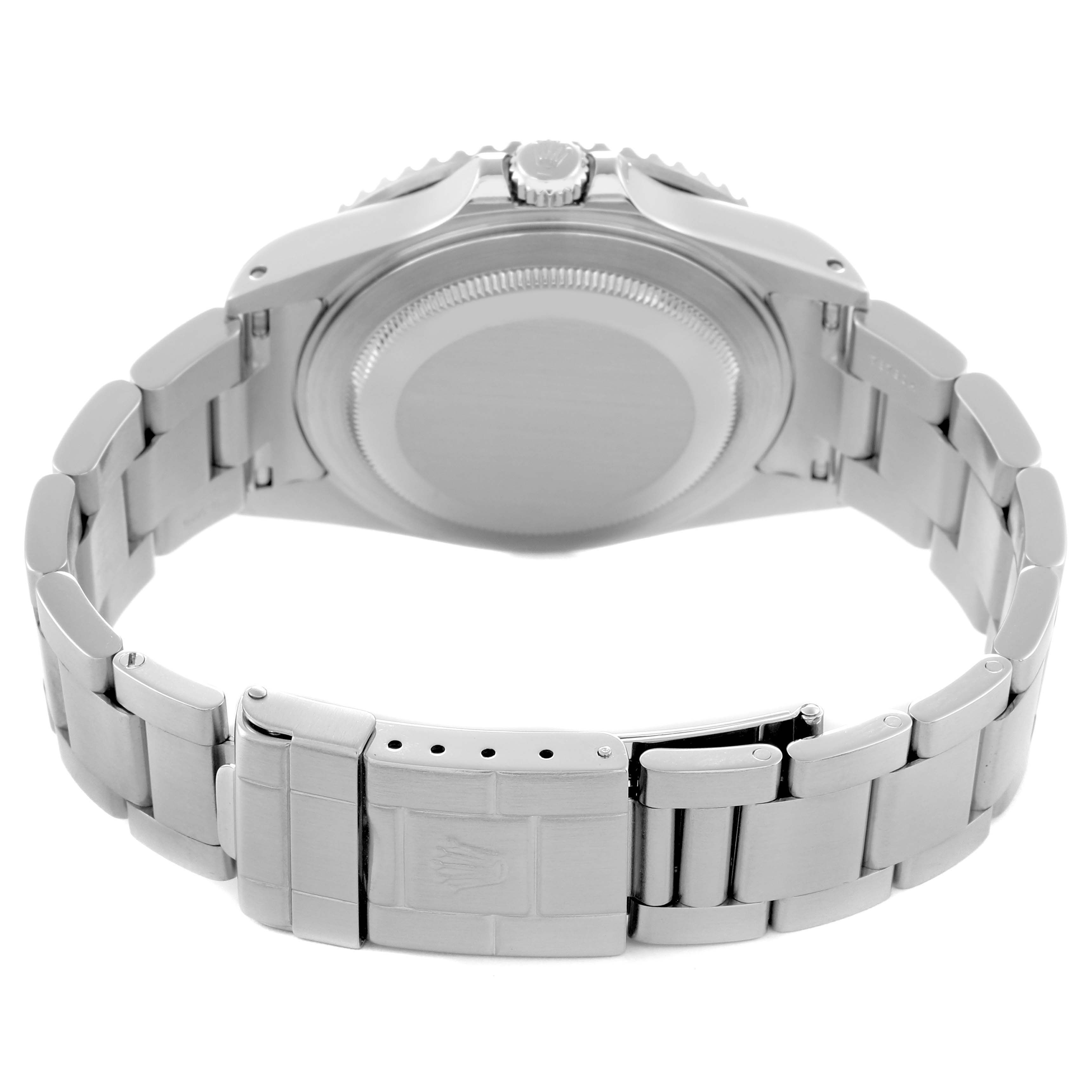 The image shows the back view of a Rolex GMT-Master model 16710, highlighting the clasp, bracelet, and case back.