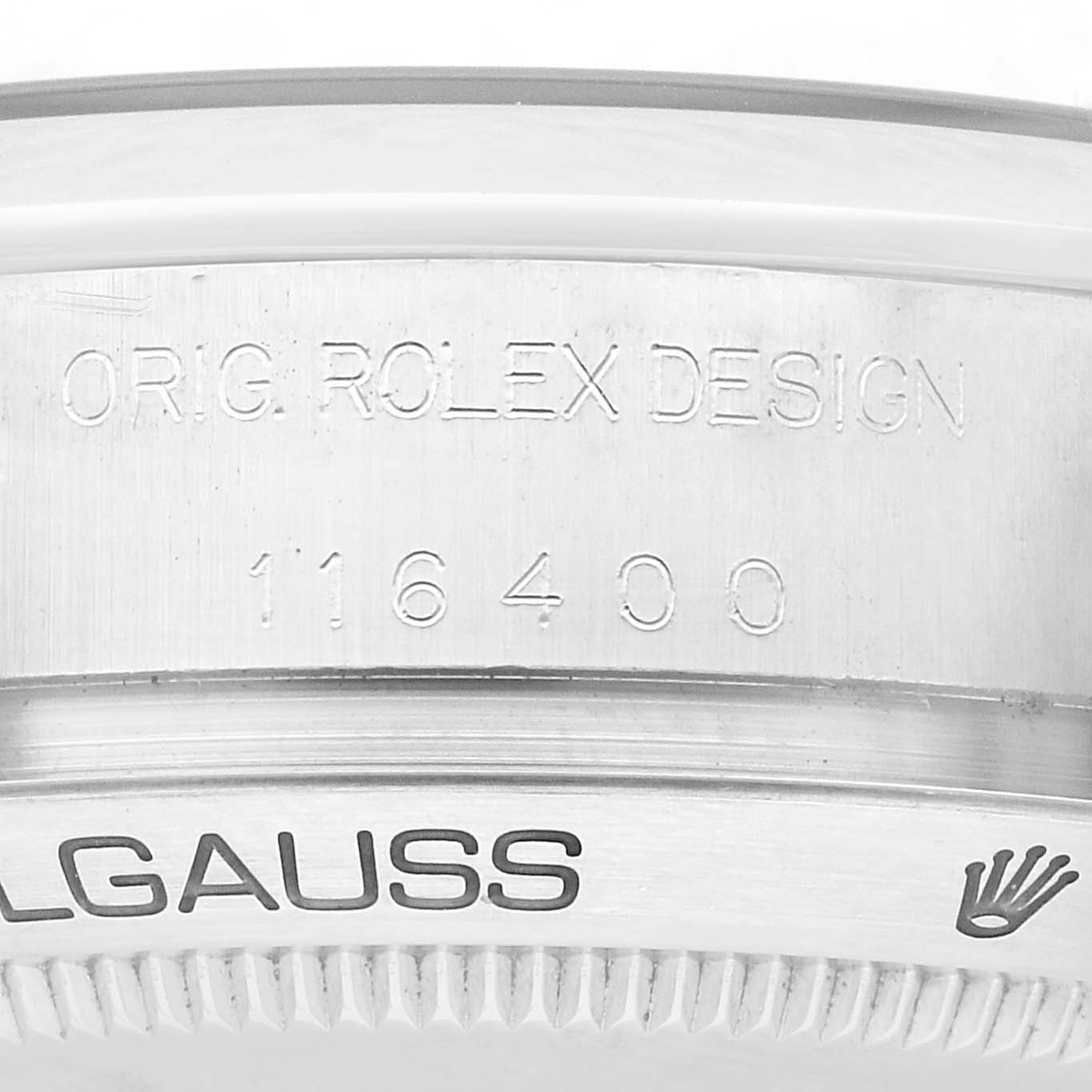 The image shows a close-up of the case side and bezel of the Rolex Milgauss 116400 Men's Stainless Steel White Dial 116400 Men's Stainless Steel White Dial watch, with the model number and "ORIG. ROLEX DESIGN" inscribed.