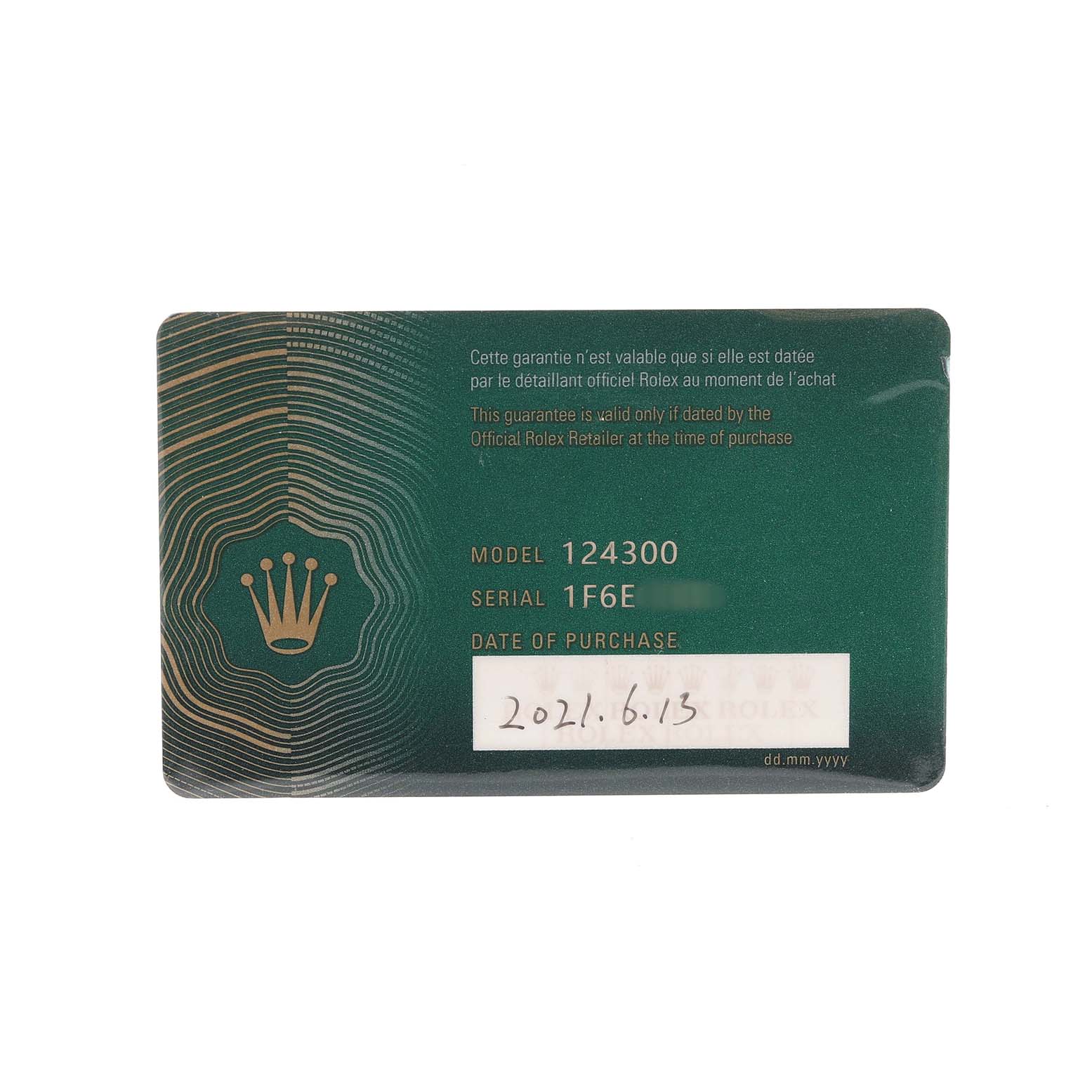 The image shows a green warranty card for a Rolex Oyster Perpetual 124300 Men's Stainless Steel Silver Dial, displaying the model number, serial number, and purchase date.