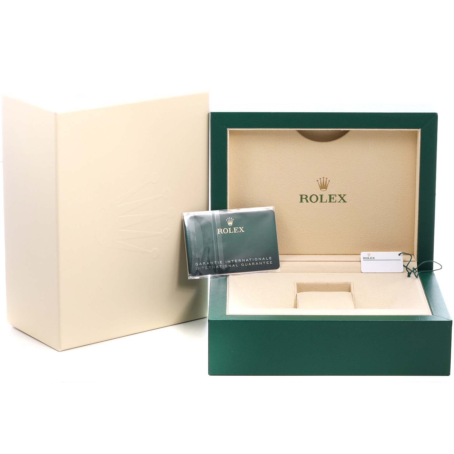The image shows an open Rolex Oyster Perpetual 124300 Men's Stainless Steel Silver Dial box with the international guarantee card and tags inside.