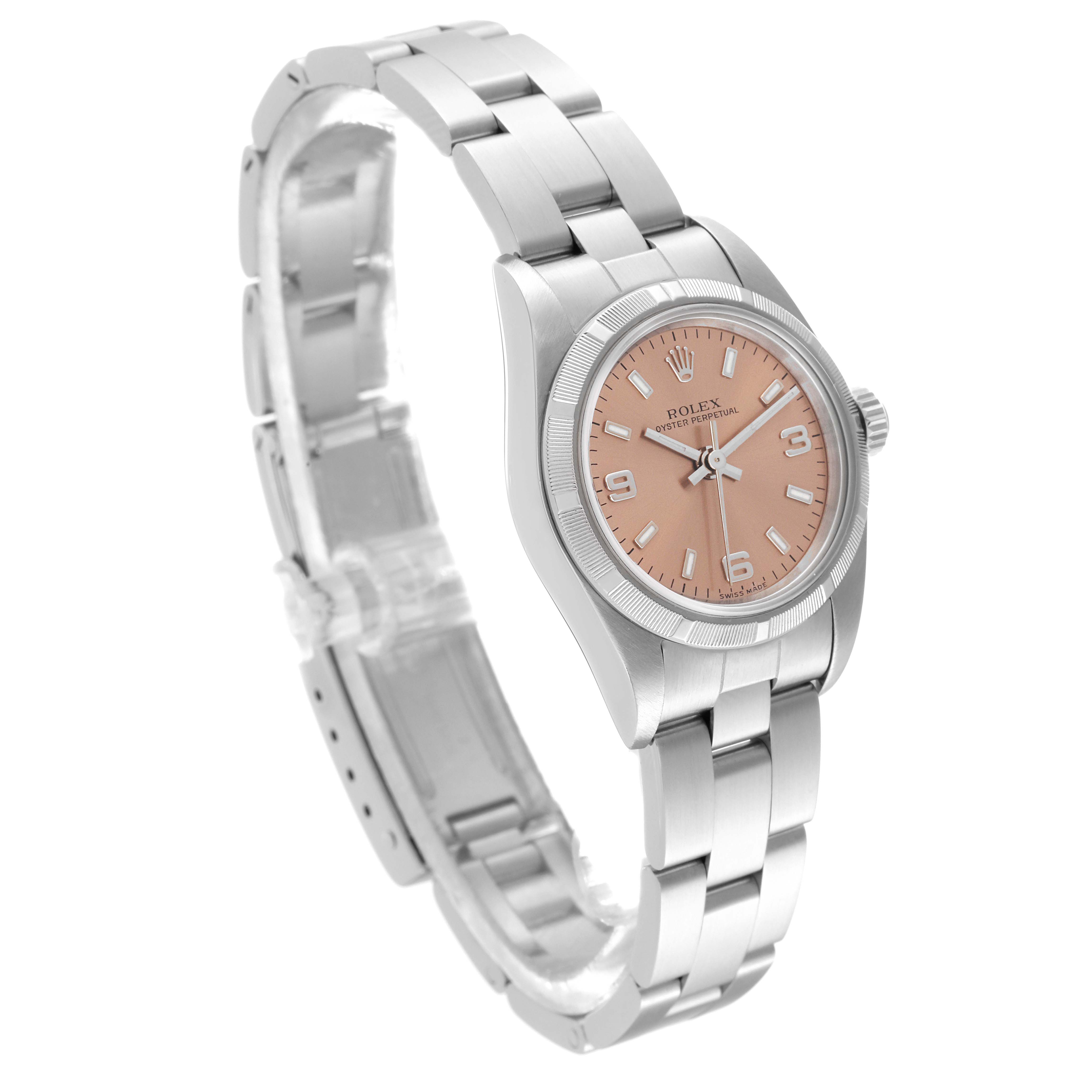 The Rolex Oyster Perpetual 76030 Women's Stainless Steel Pink Dial 76030 Women's Stainless Steel Pink Dial watch is shown from a three-quarter angle featuring its bracelet, case, crown, and dial.
