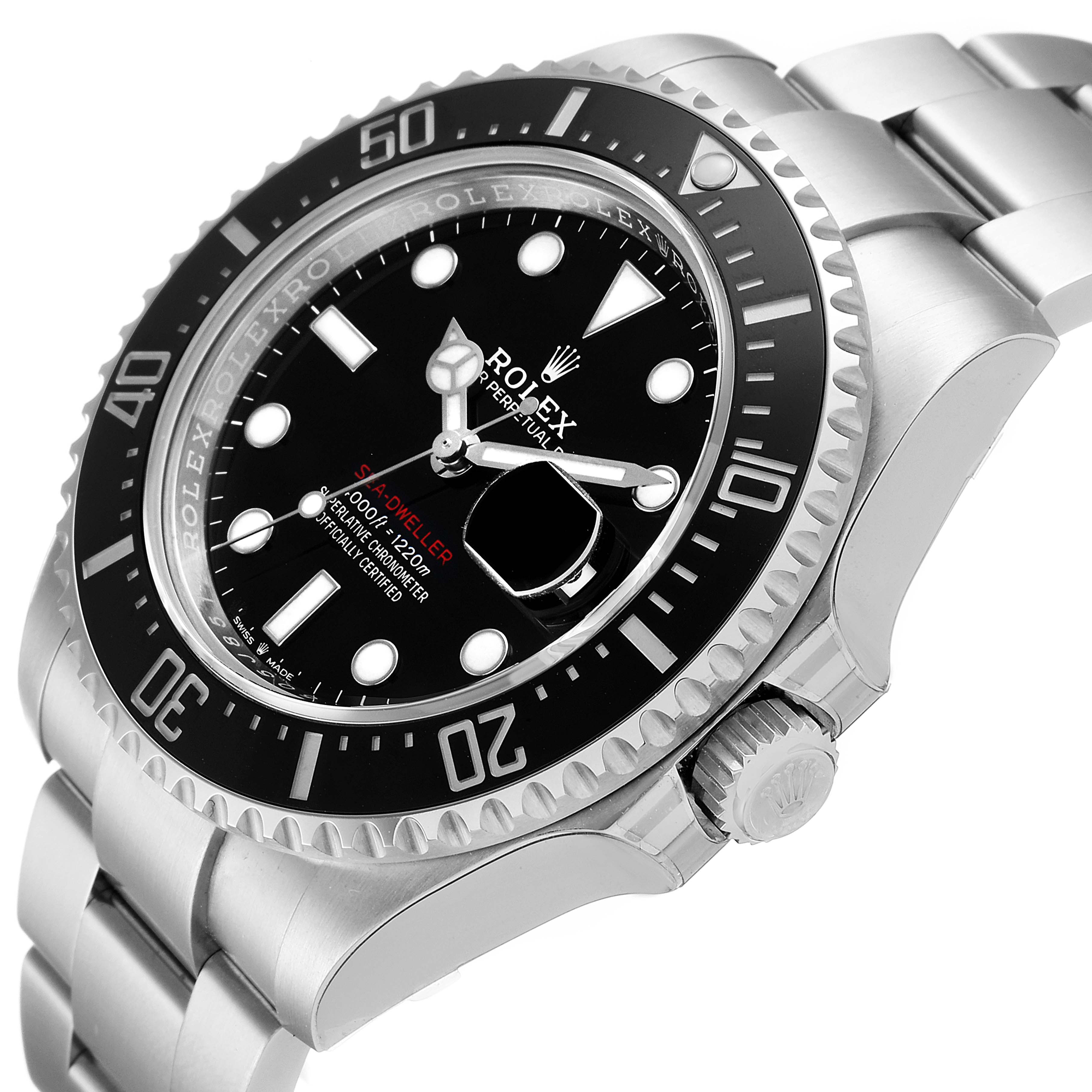 The image shows a close-up angled view of the Rolex Sea-Dweller 126600 Men
s Stainless Steel Black Dial 126600 Men
s Stainless Steel Black Dial watch, highlighting the dial, bezel, and part of the bracelet.
