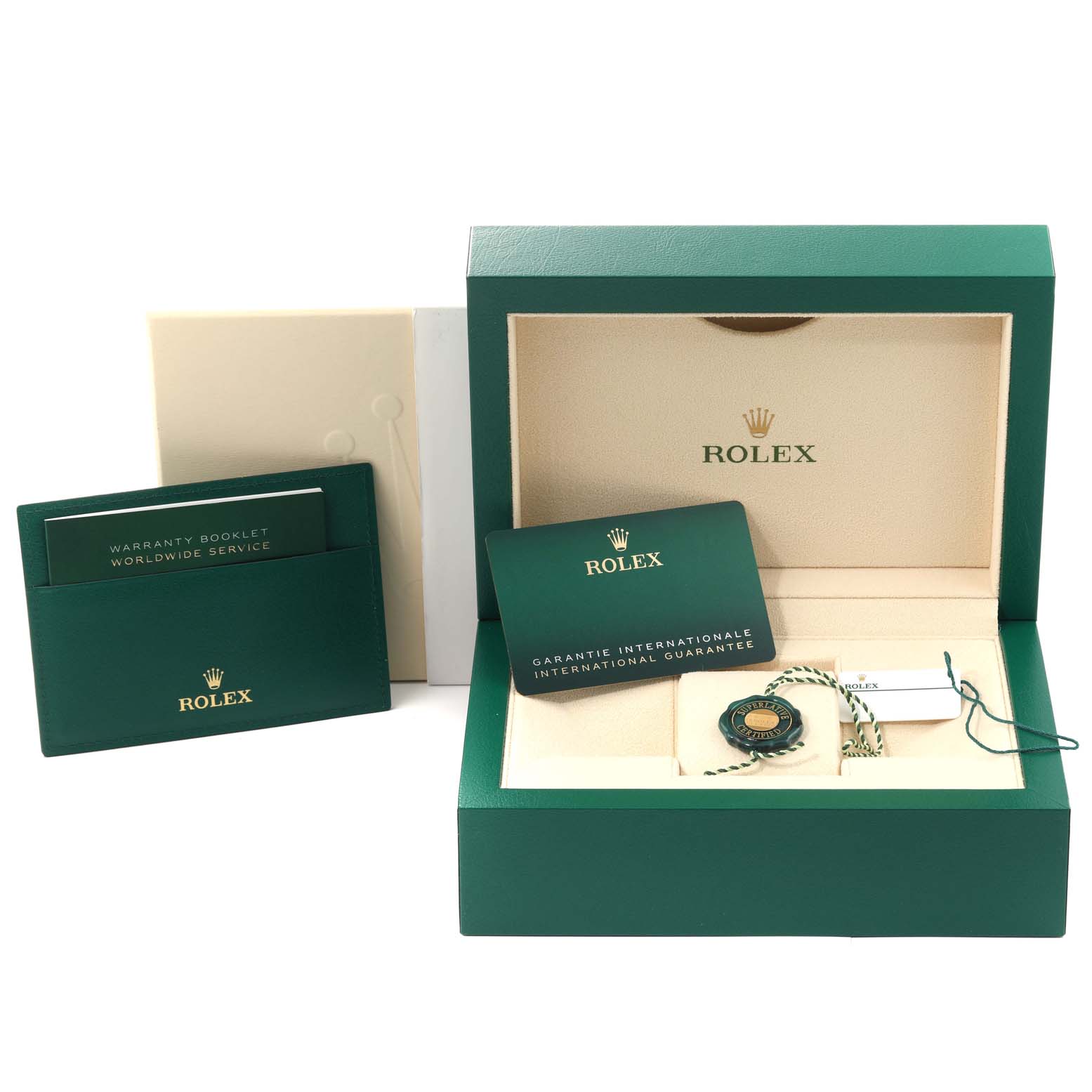 The image shows the opened box and accompanying accessories of the Rolex Sea-Dweller 126660 Men
s Stainless Steel Black Dial 126660 Men
s Stainless Steel Black Dial, including warranty booklet and guarantee card.