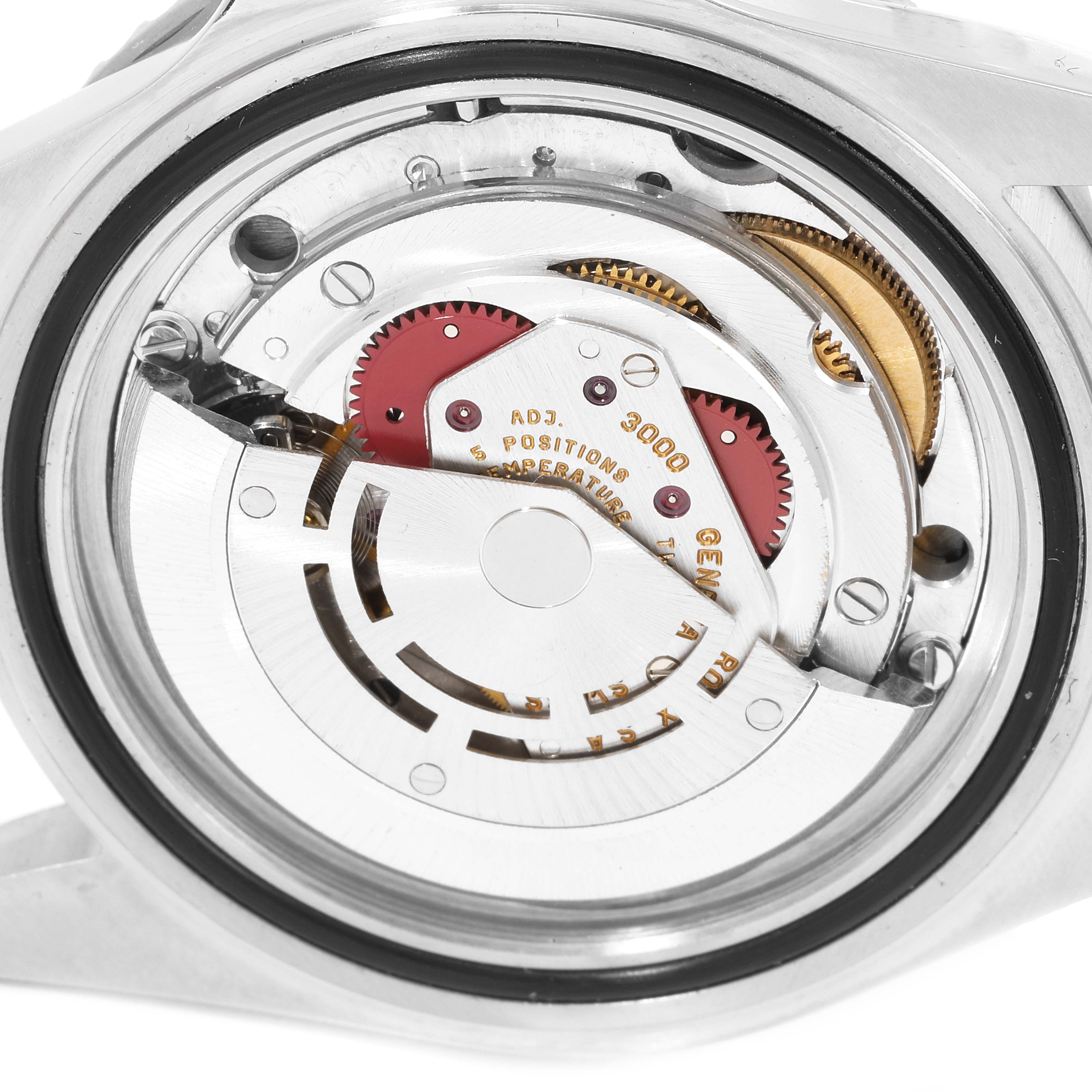 The image shows a close-up view of the inner mechanical movement of a Rolex Submariner 14060 Men
s Stainless Steel Black Dial 14060 Men
s Stainless Steel Black Dial watch.